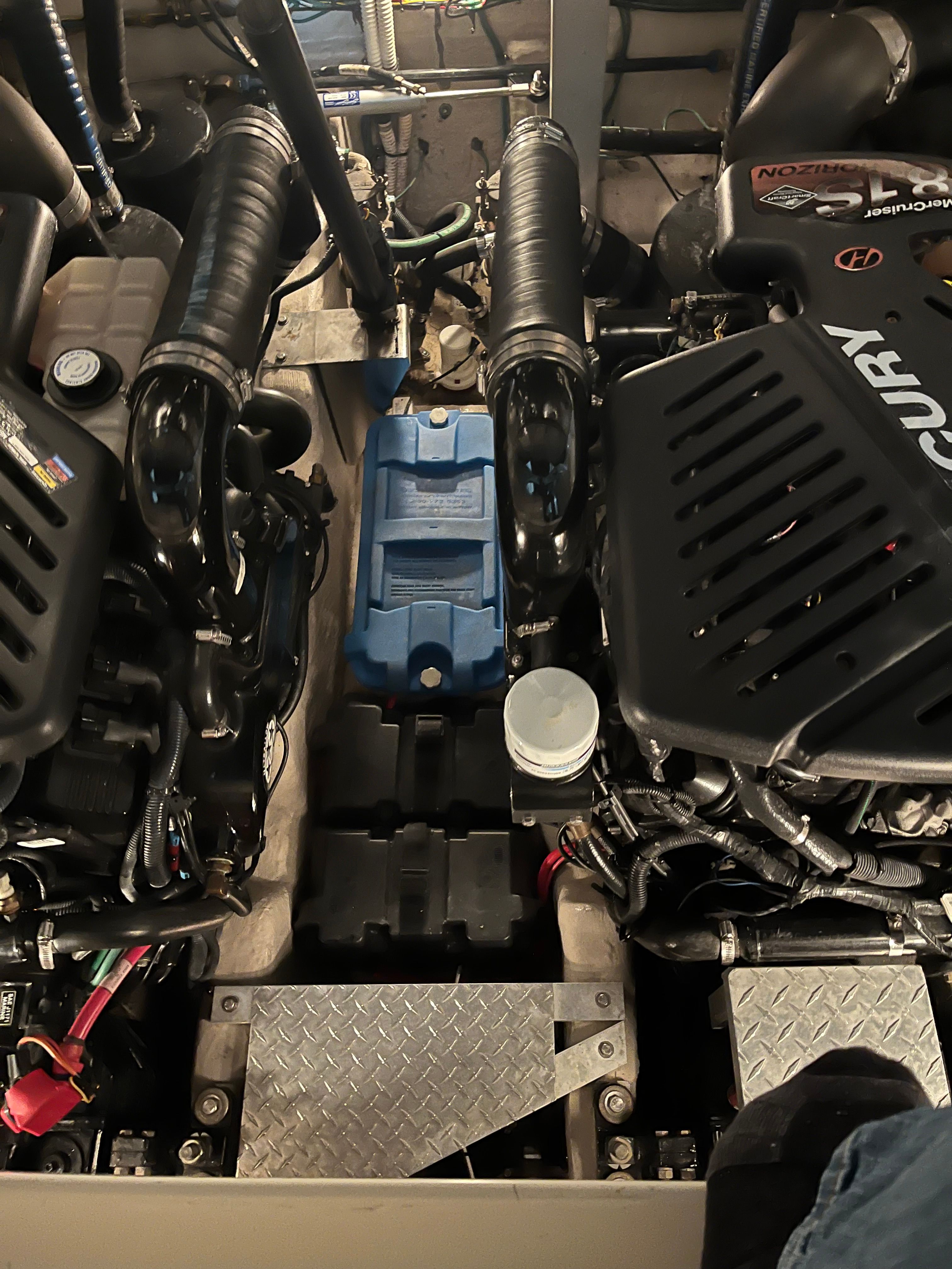 Engine room of a 2005 Sea Ray Sundancer boat with Mercury engines.