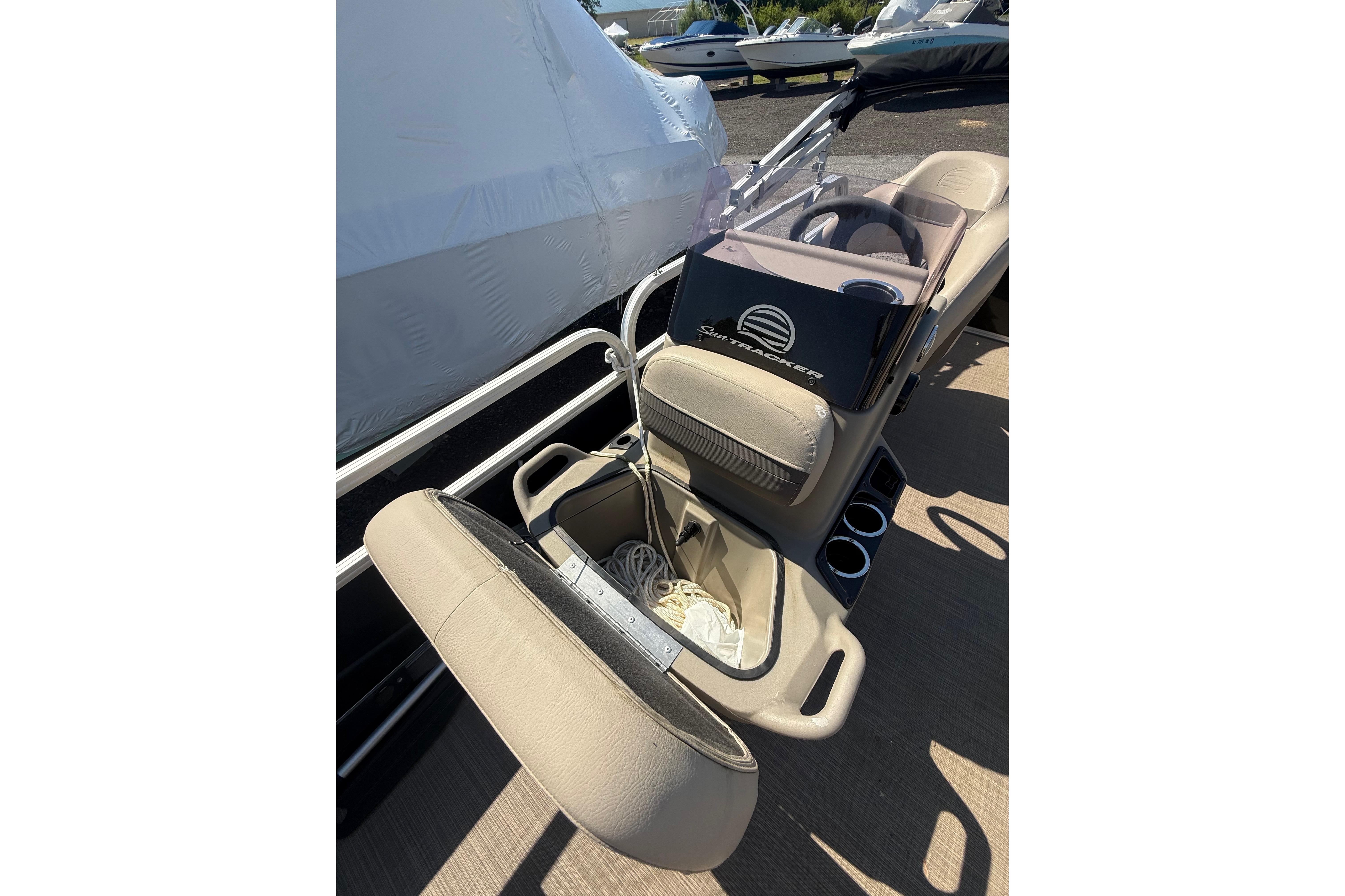 2021 Sun Tracker Bass Buggy 16 XL Select boat interior with storage and seating.
