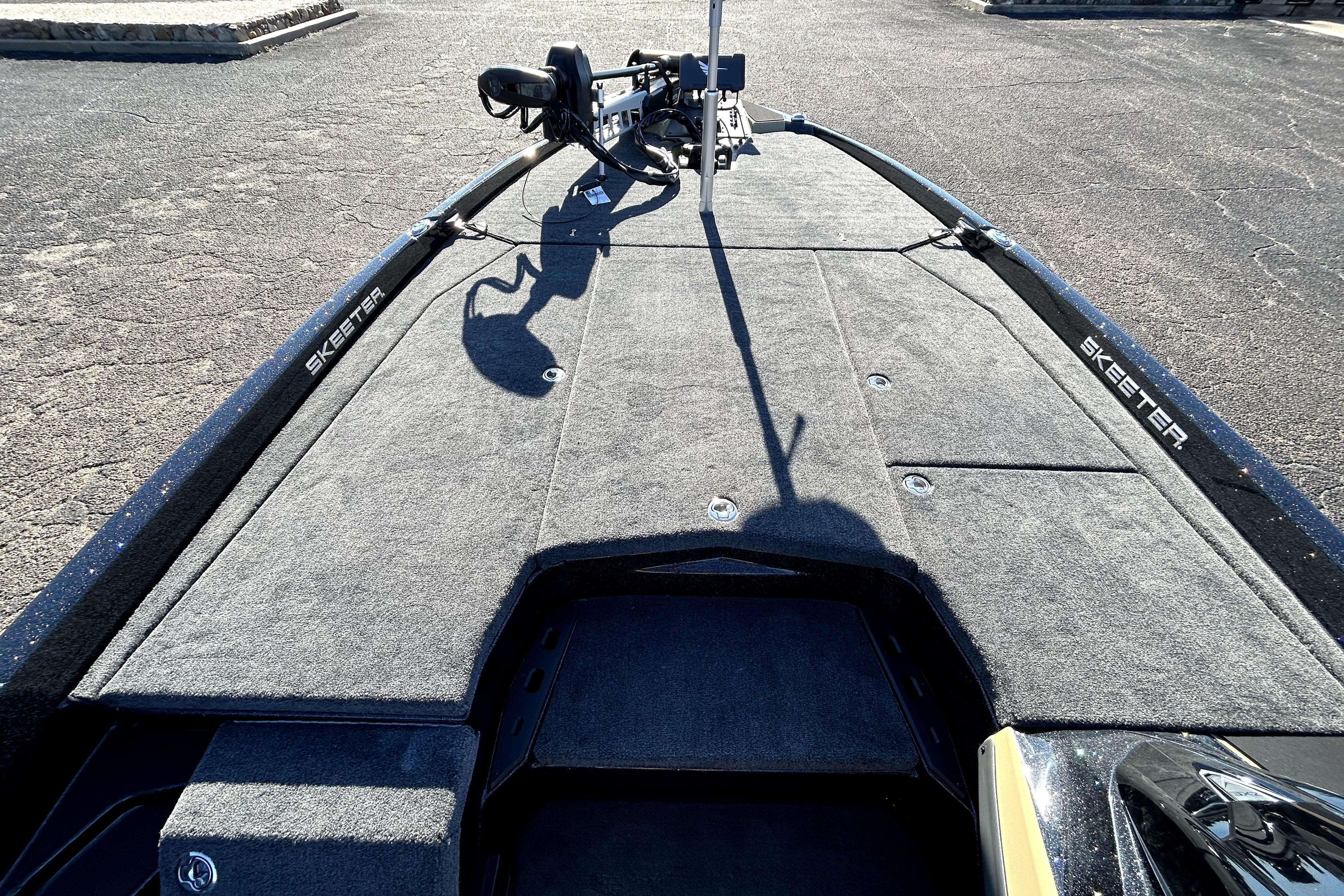 2026 Skeeter ZXE21 boat deck with carpeted surface and mounted equipment.