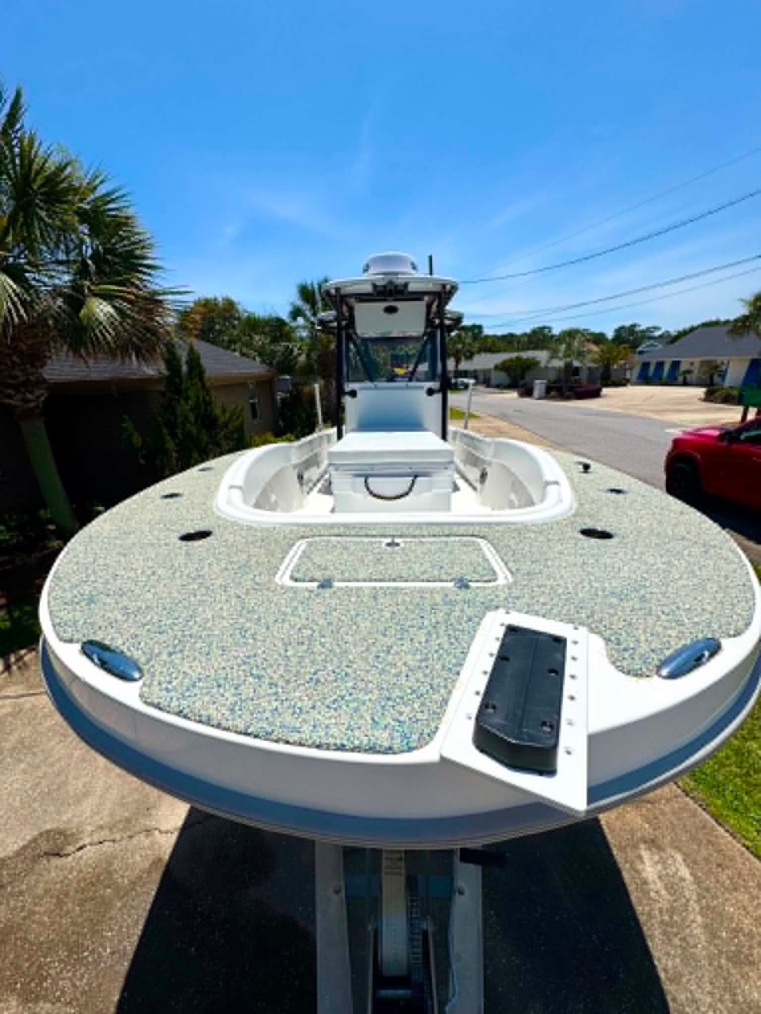 2023 Dusky 278 XFT boat on trailer, front view.