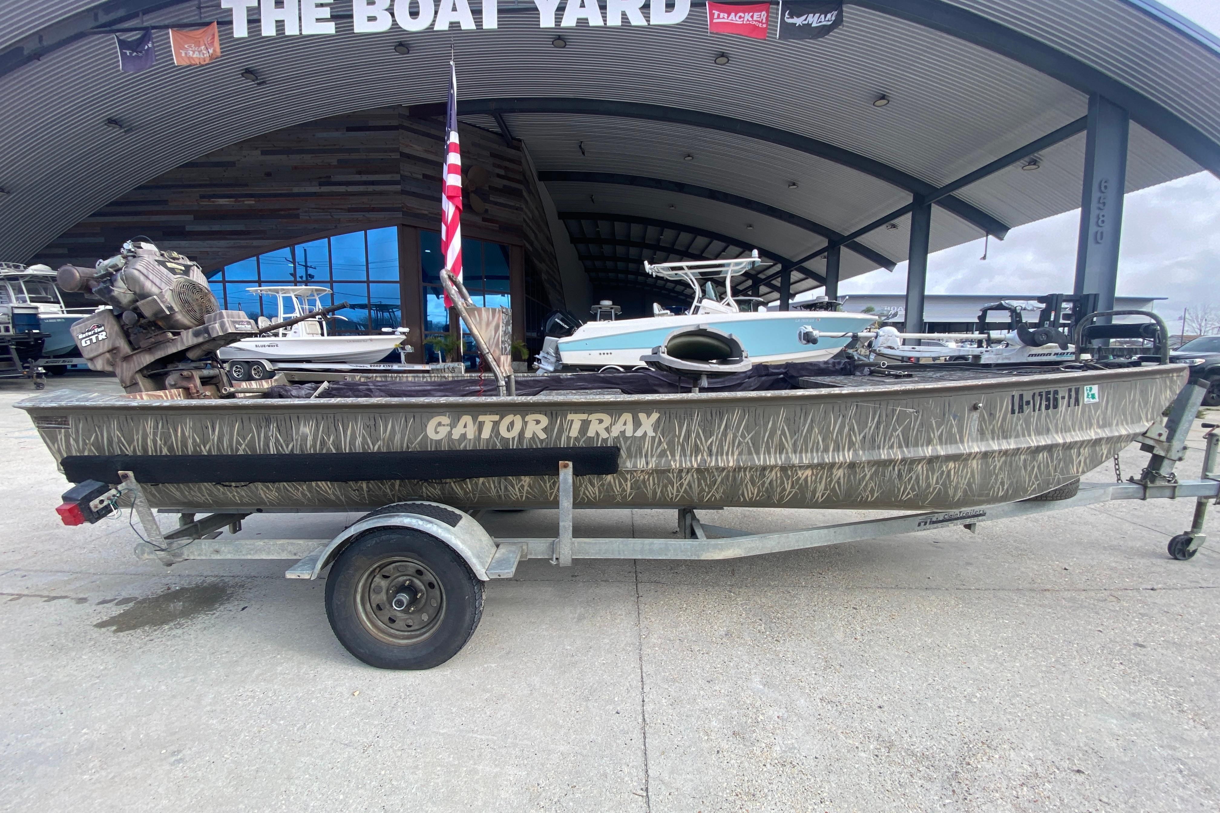 2009 Gator Trax MUD BUDDY boat on trailer at The Boat Yard.