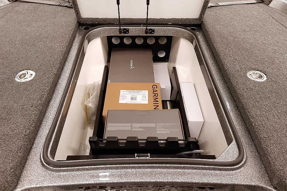 Storage compartment of 2026 Ranger Z519R Cup-Equipped boat with Garmin equipment boxes.