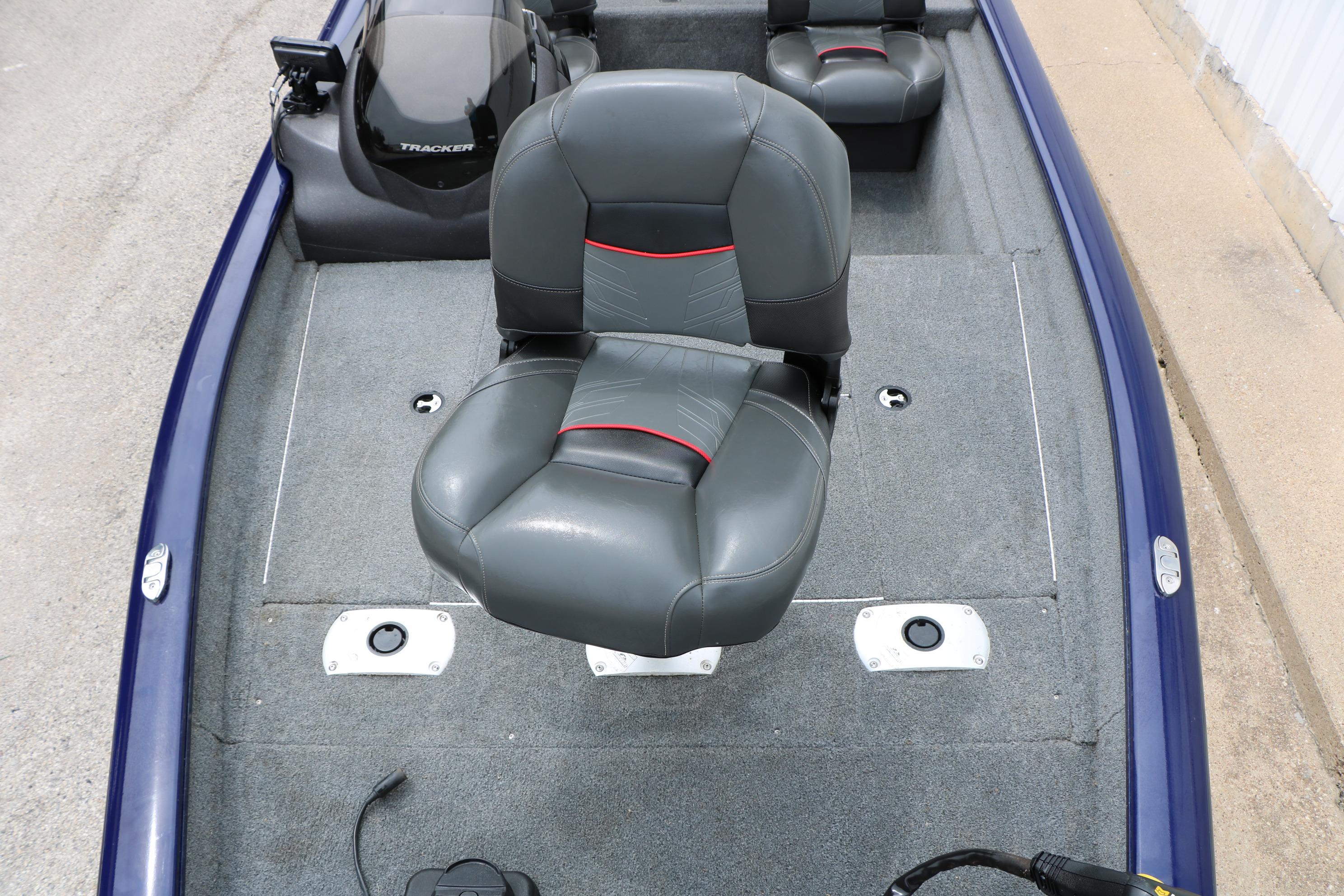 2022 Tracker Pro Team 175 TF boat interior with gray seating and carpeted deck.