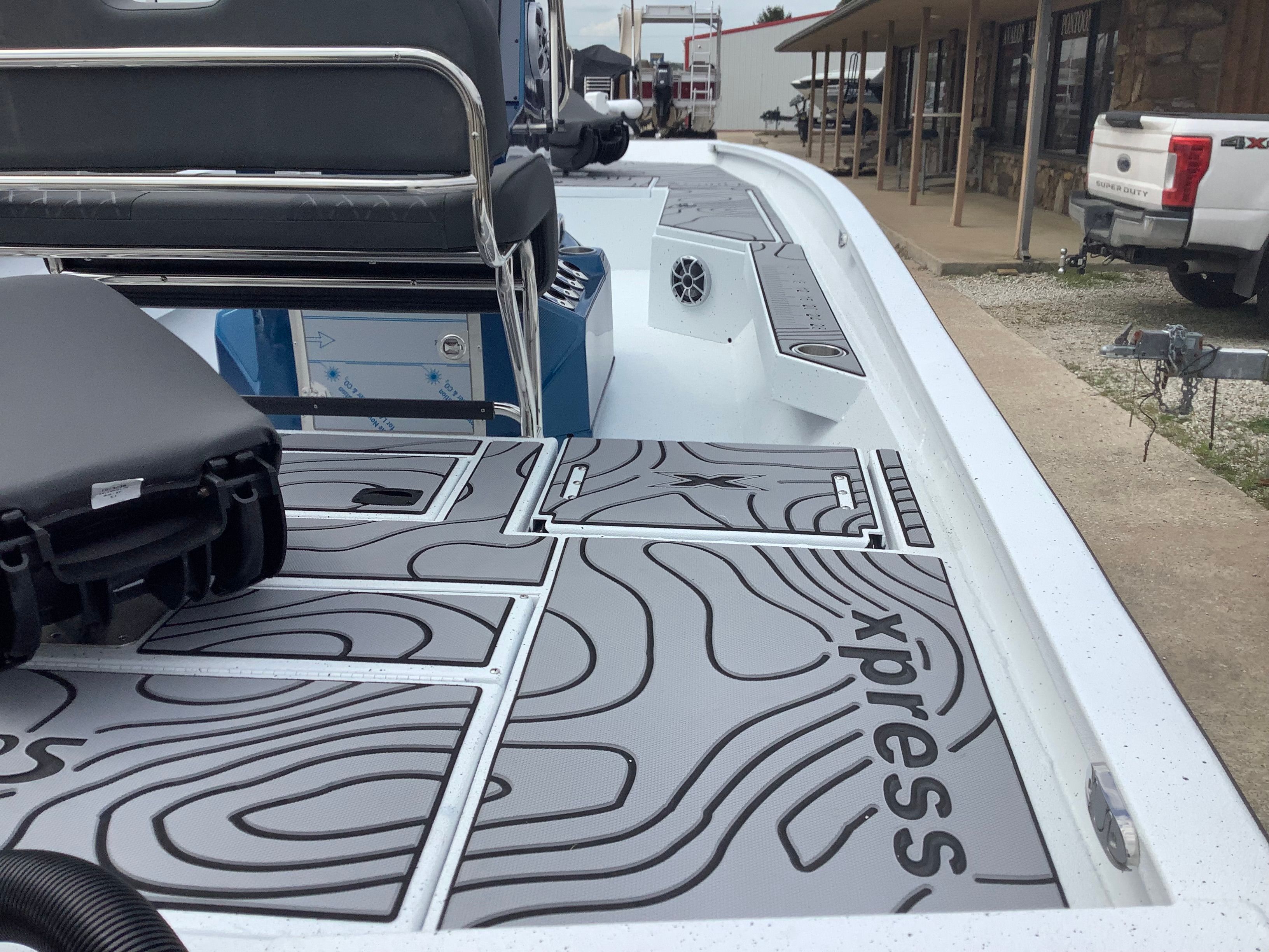 2026 Xpress H22B Bay boat with textured deck design.