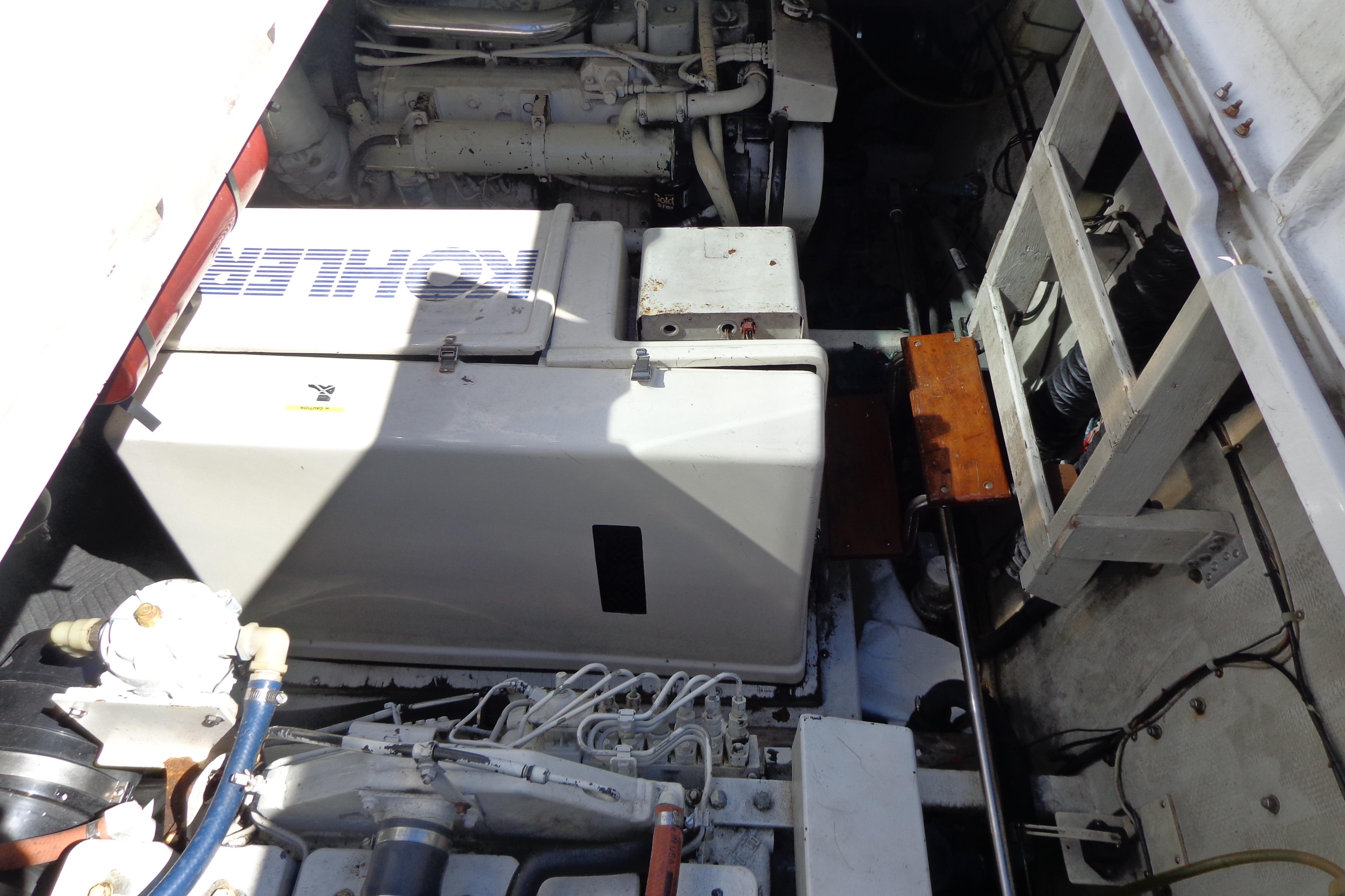 Engine compartment of a 1992 Cruise-A-Home Corsair 4200 with Kohler generator.