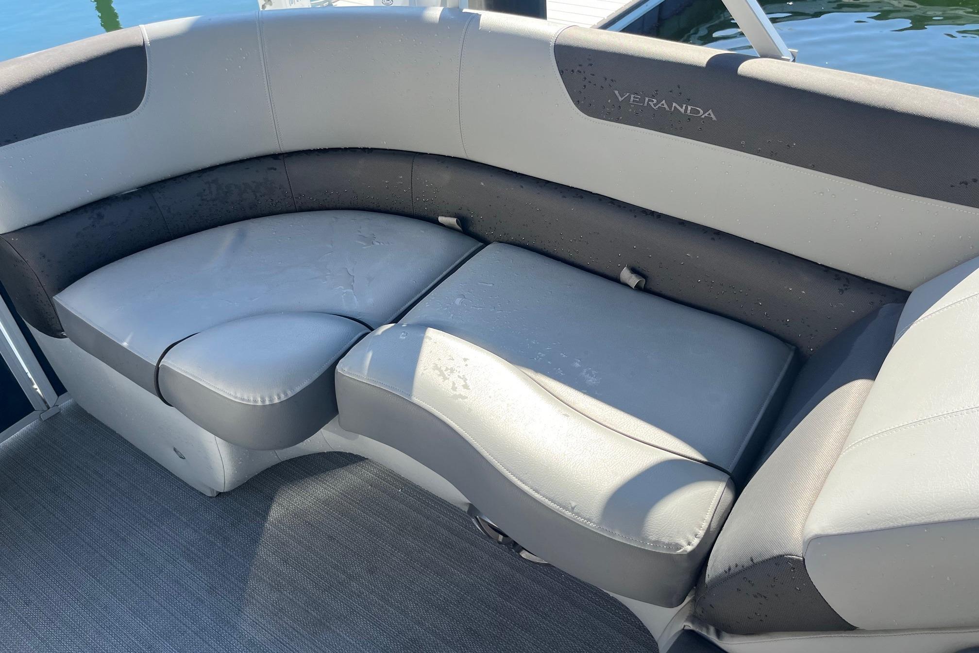 2023 Veranda Relax VR22RC boat seating with gray upholstery, wet from water exposure.