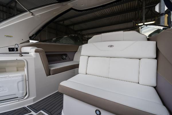 2016 Regal 28 Express boat interior with white seating and modern design.