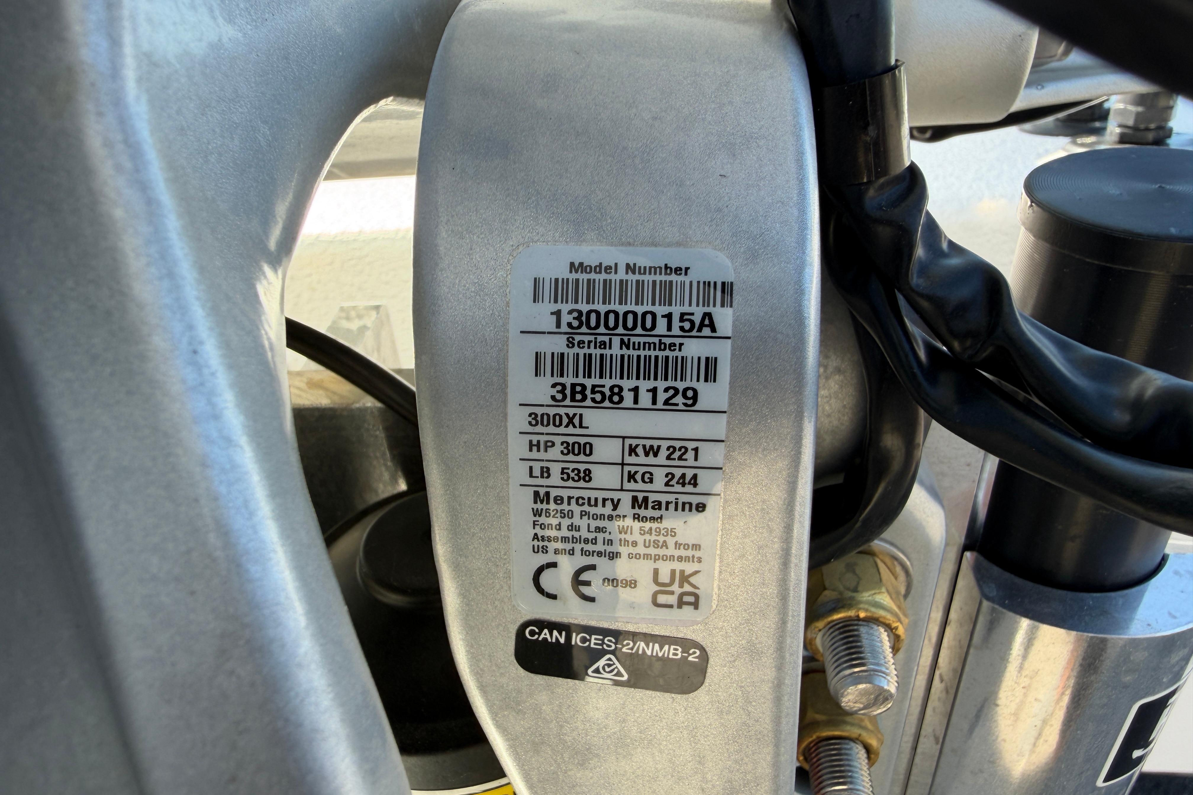 Label on Skuta 24 Cat 2026 engine, showing model and serial numbers, Mercury Marine details.