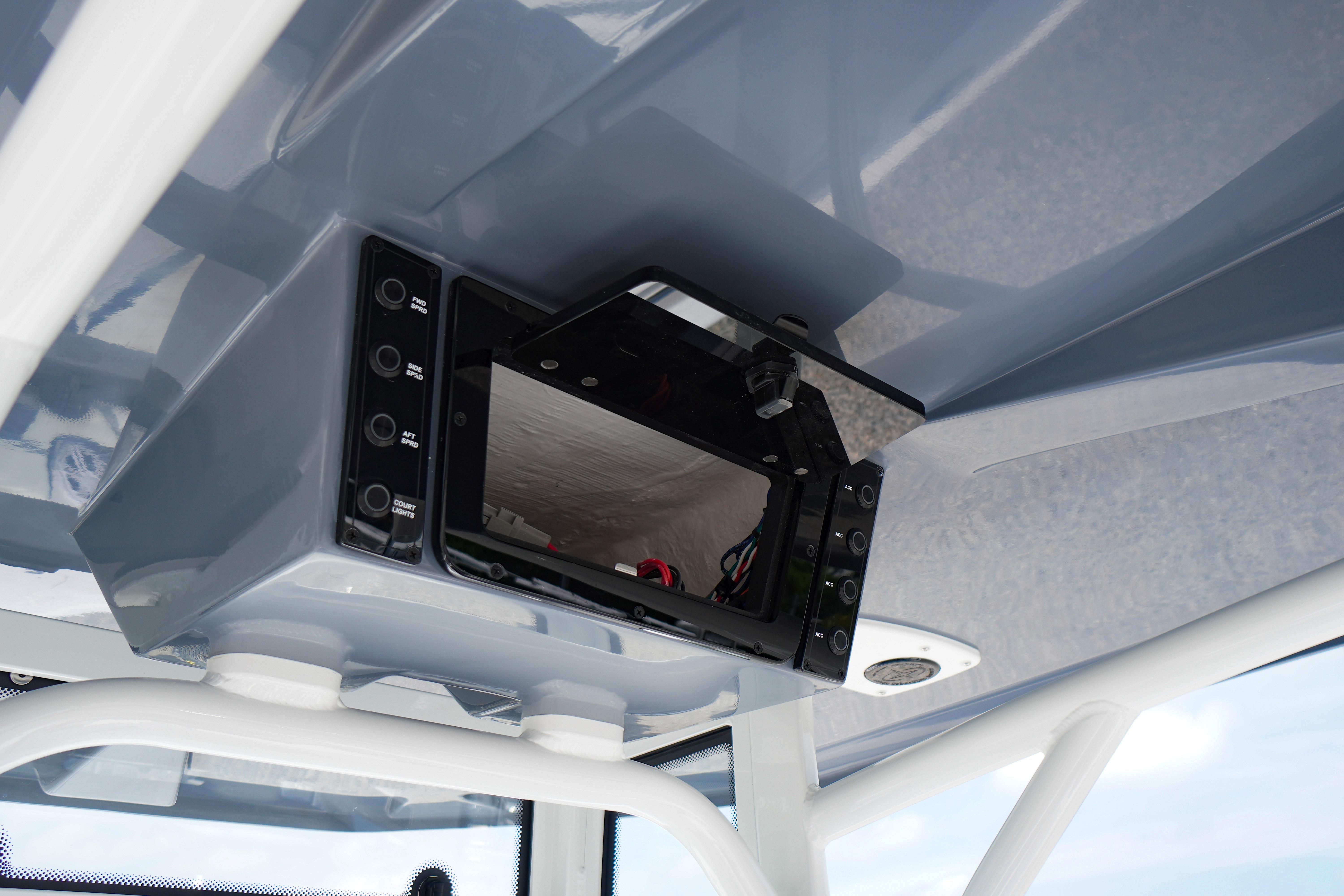 Overhead console of 2027 Tidewater 220 CC Adventure boat, featuring control panel and wiring.