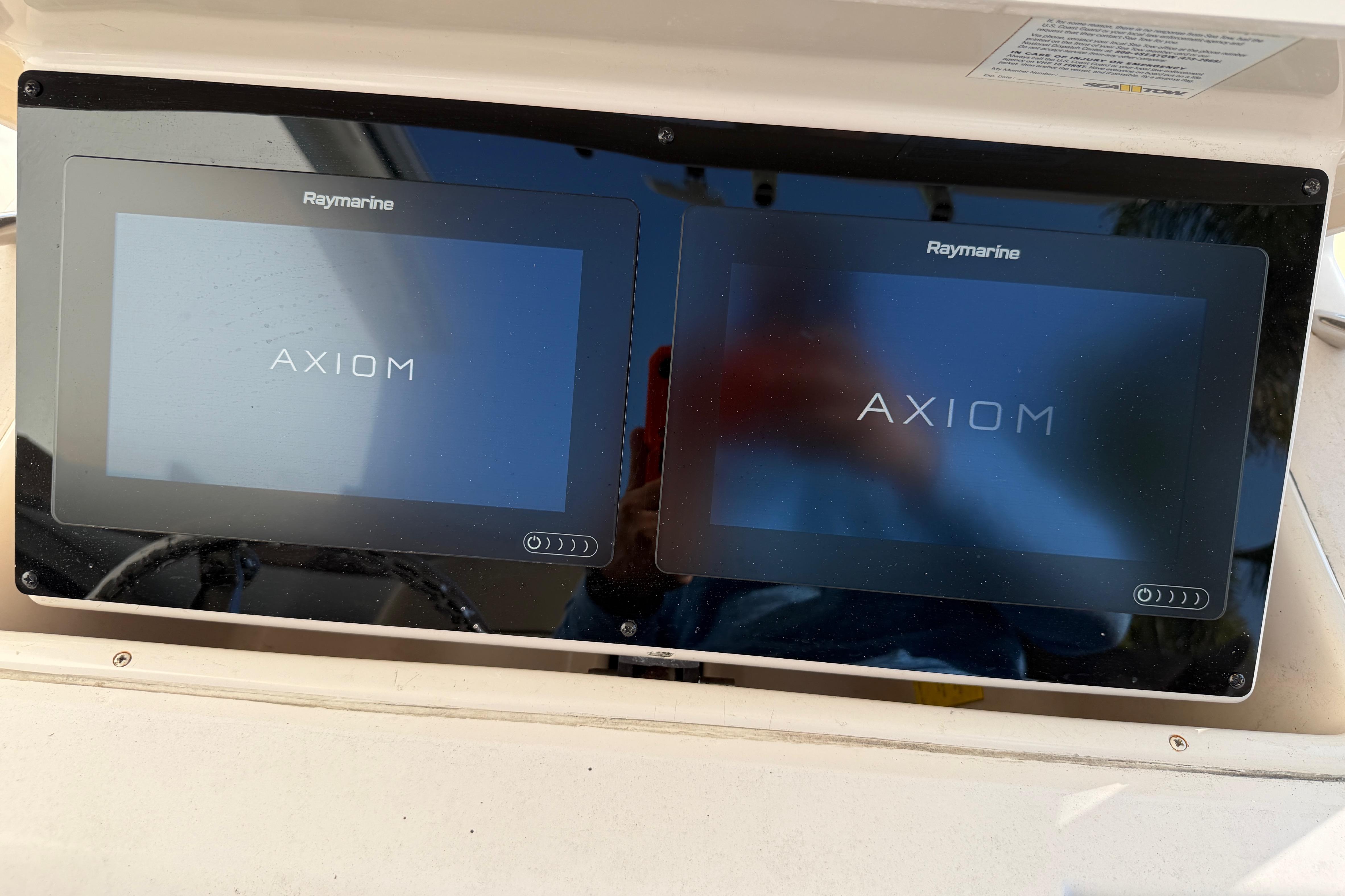 Raymarine Axiom displays on 2004 Grady White 273 boat dashboard.