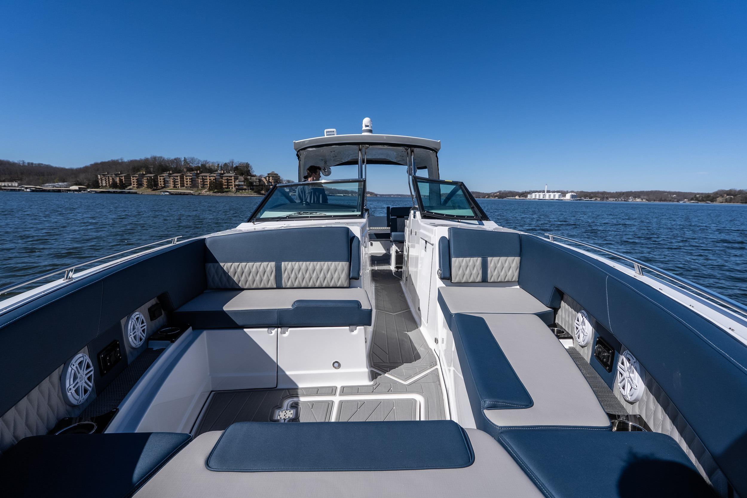 2026 Monterey 378SS Super Sport boat interior with luxurious seating on a sunny day.