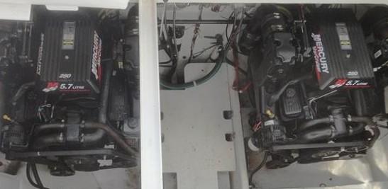Twin Mercury engines in a 2001 Bayliner 3055 Ciera boat engine compartment.