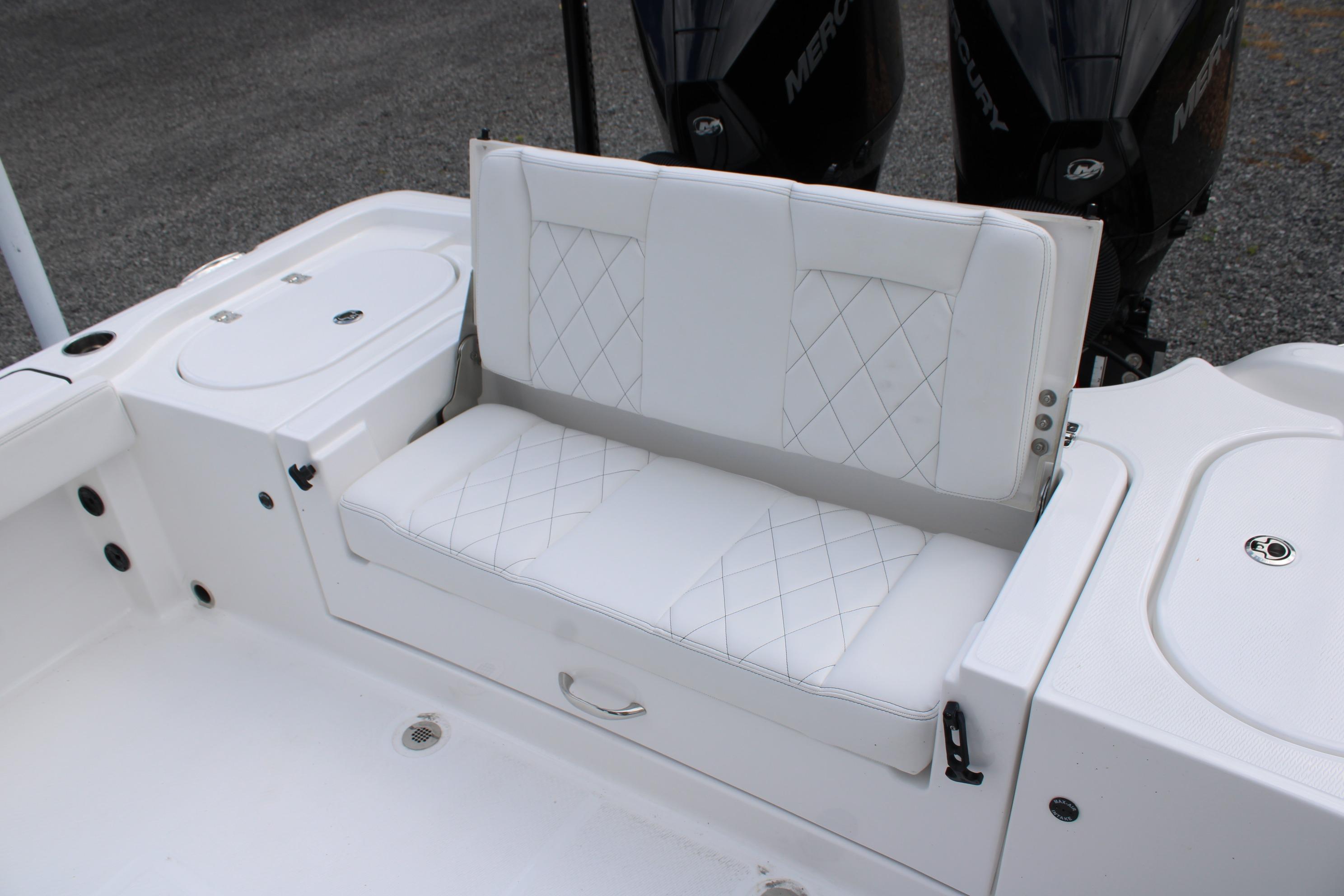 White seating area on 2027 Blazer Bay Makaira 2800 boat with dual Mercury engines.