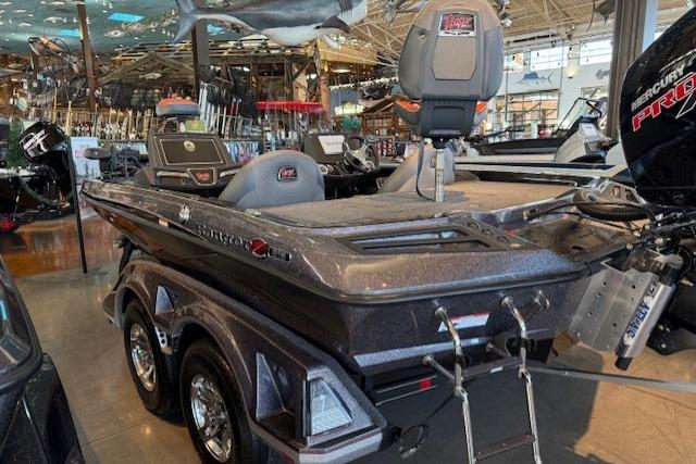 2025 Ranger Z518 Cup-Equipped boat in showroom, featuring sleek design and modern equipment.