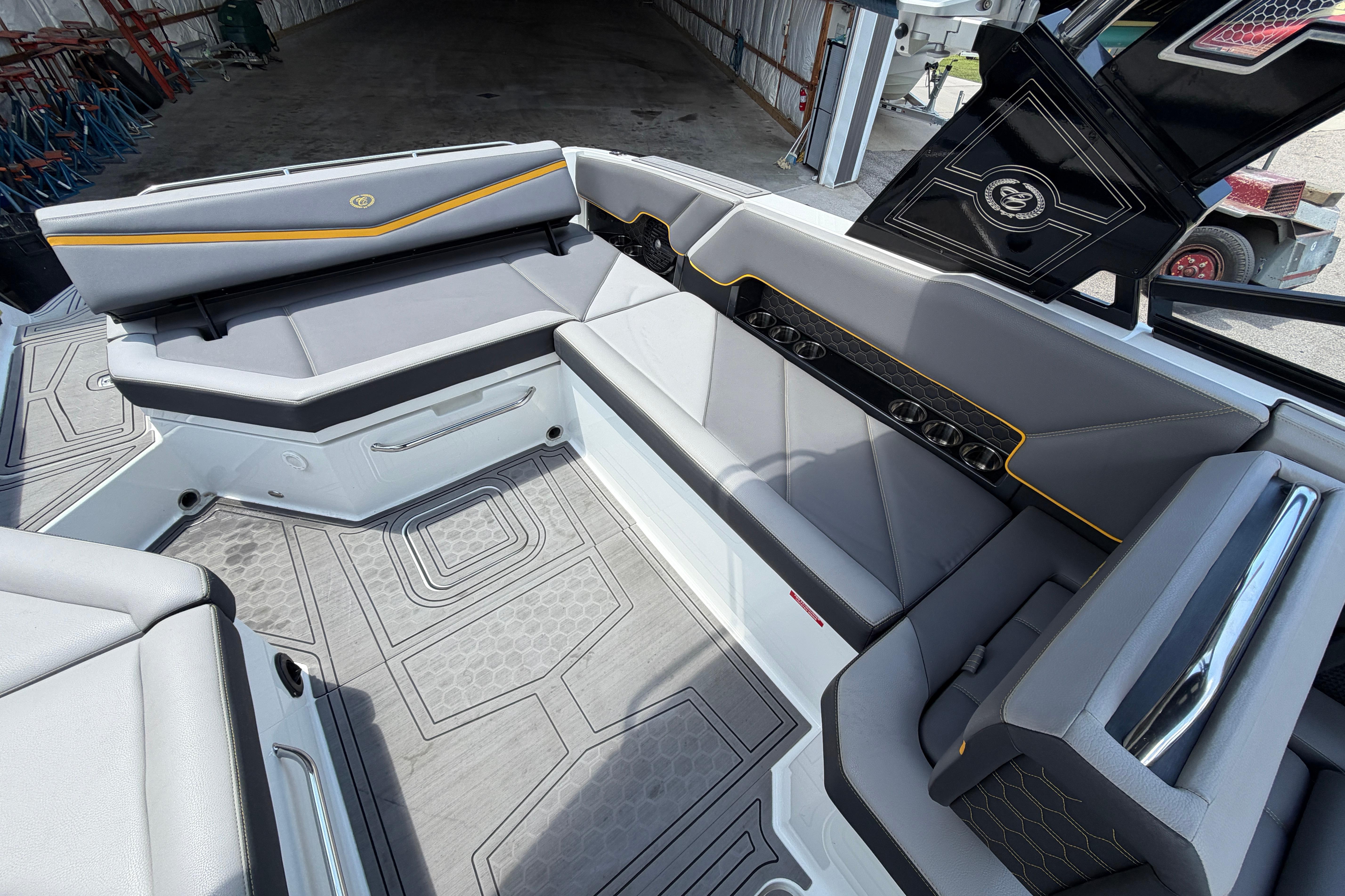 Interior of 2021 Cobalt R8 Surf boat with sleek gray seating and modern design.
