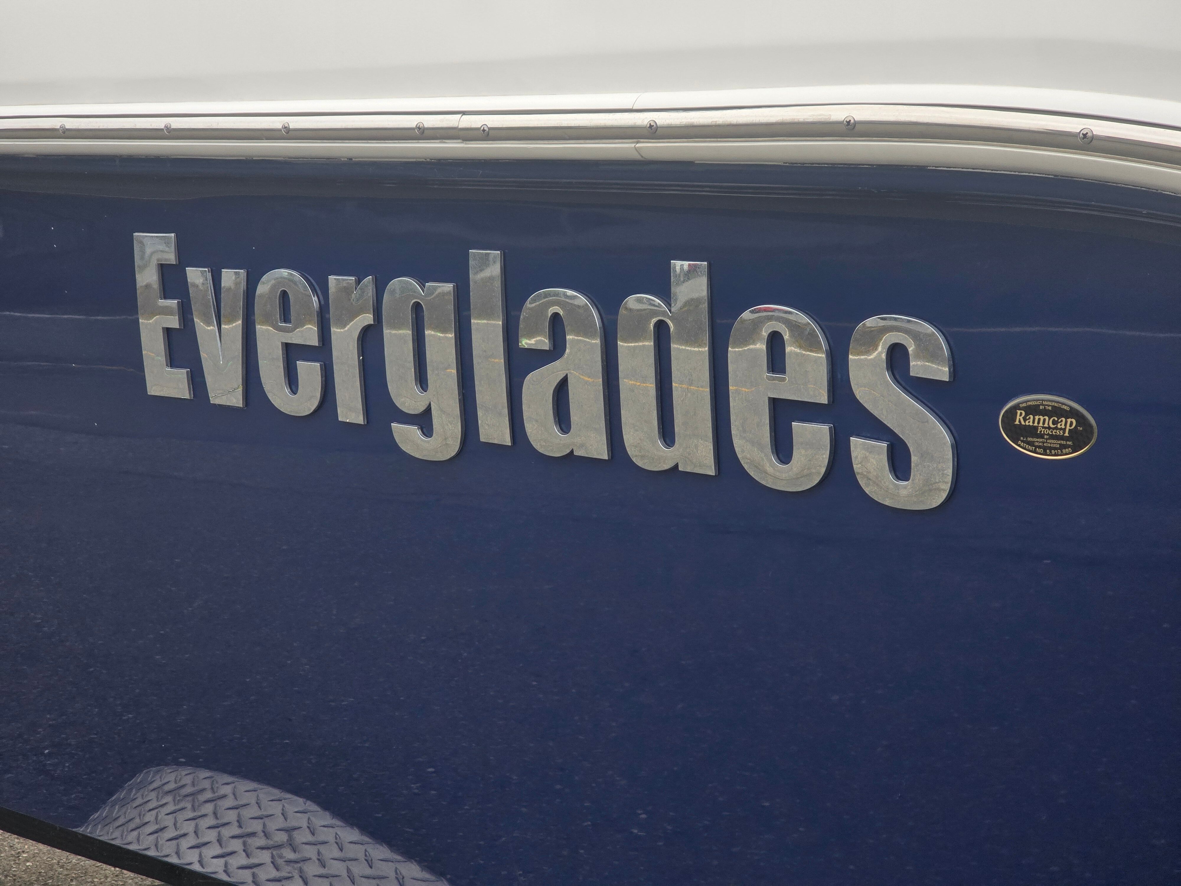 Everglades 230 Dual Console 2017 boat with a blue hull.