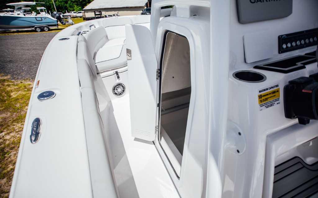 2021 Sea Fox 248 Commander boat interior with open storage compartment and seating.