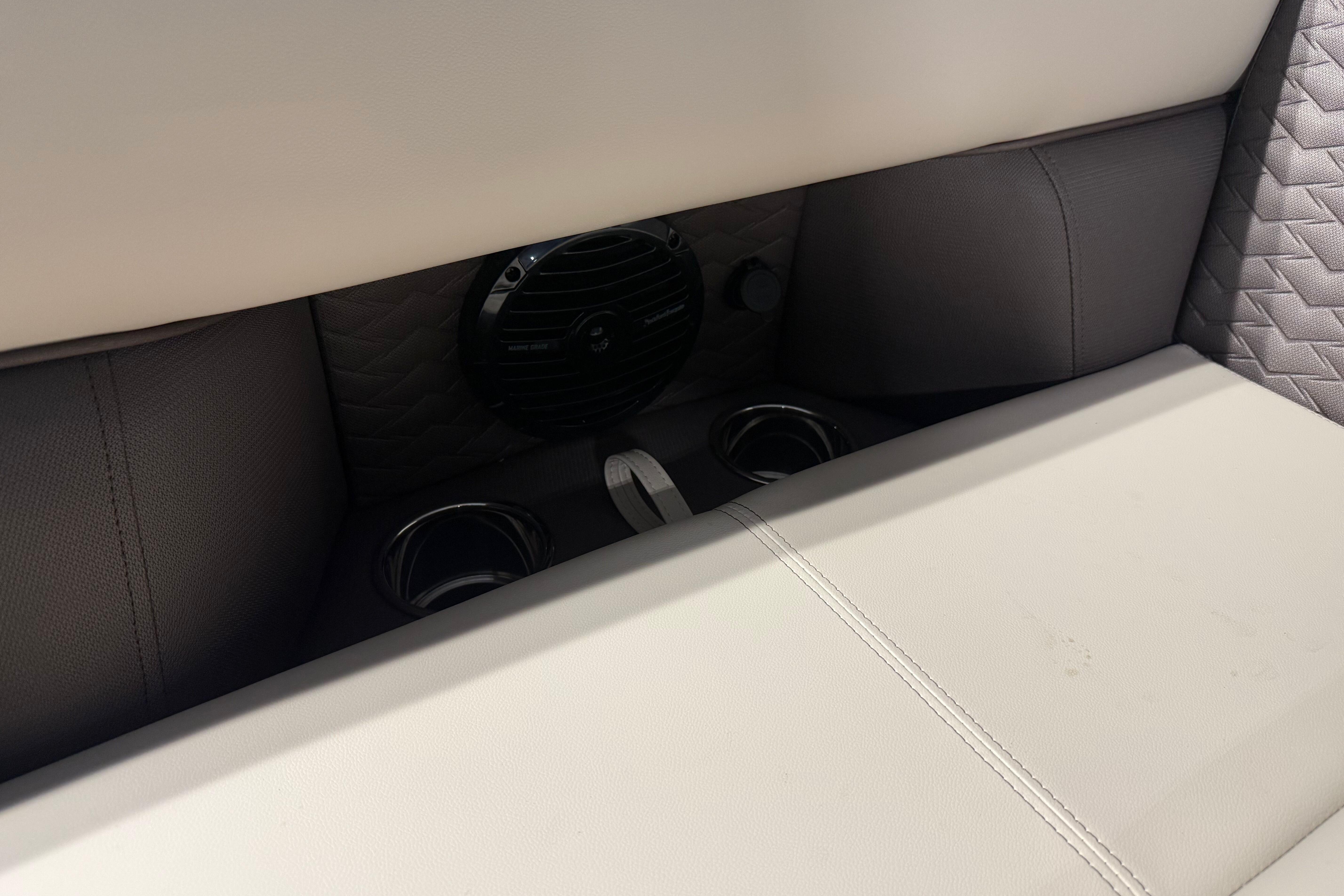 2026 Bentley Pontoons Elite 223 Admiral interior with speaker and cup holders.