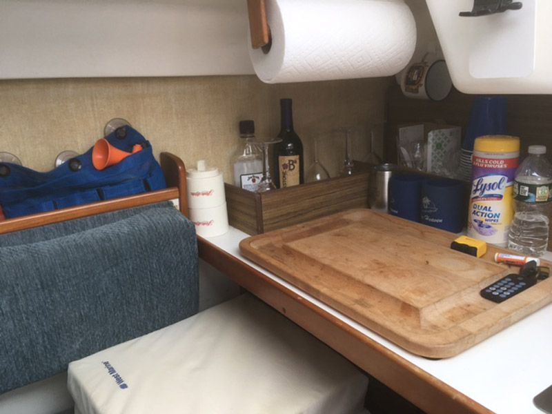 Interior of a 1975 O'Day Sloop with kitchen essentials.
