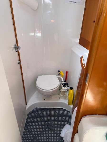 Interior of a 2000 Beneteau First 40.7 yacht featuring a toilet.