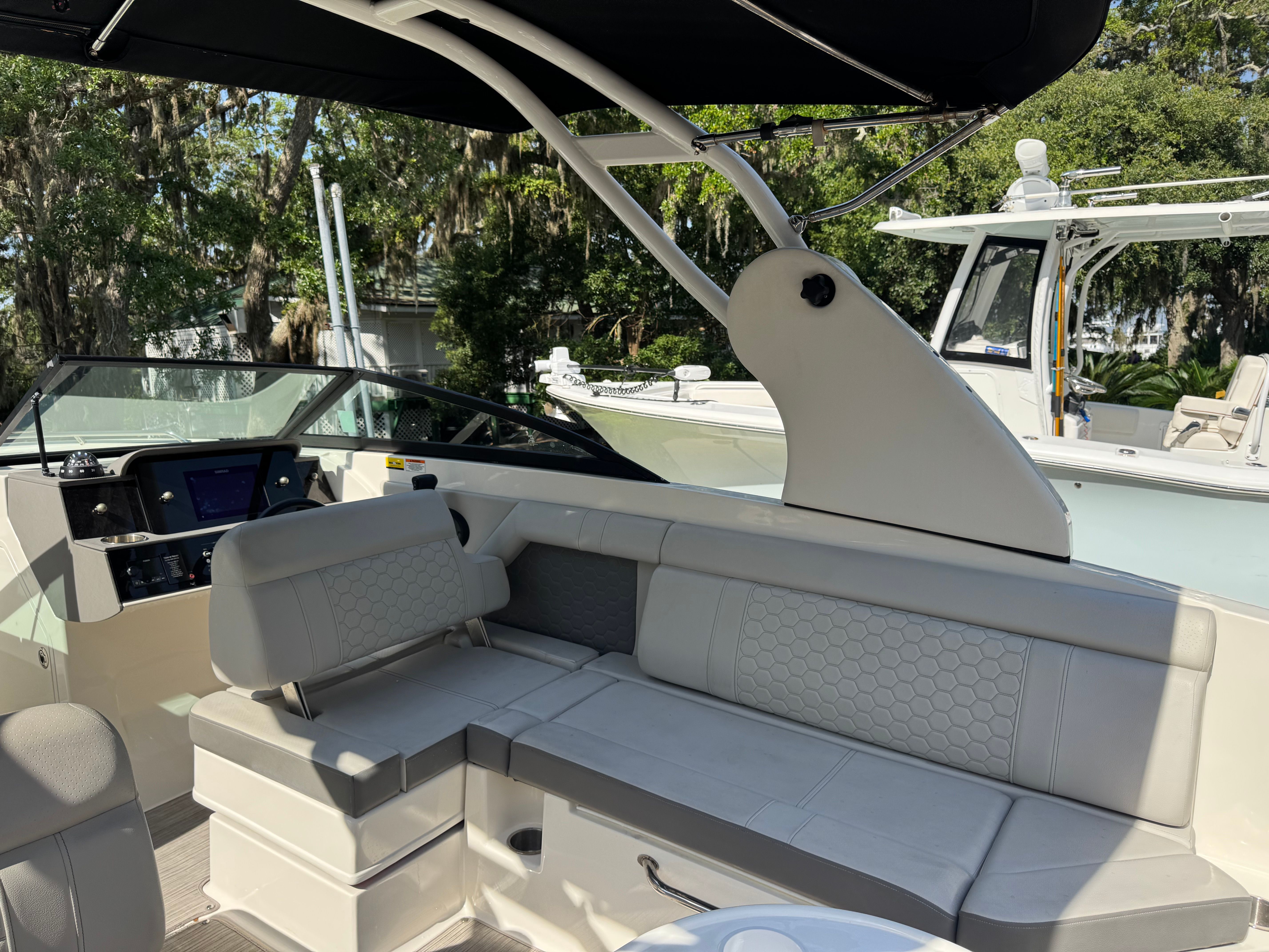 Interior of a 2020 Sea Ray SDX 270 Outboard boat with seating area.