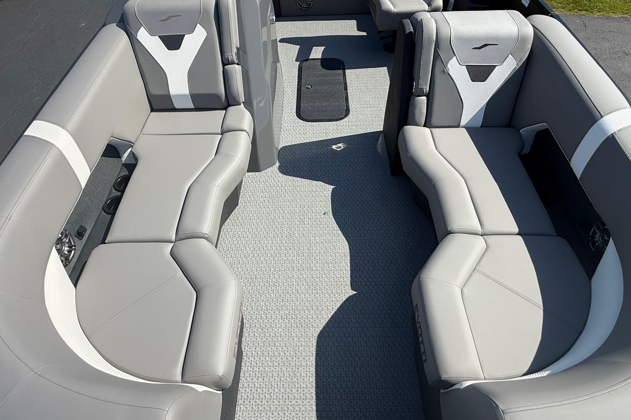 Luxurious seating on 2026 Evotti 521CS boat, featuring sleek gray upholstery and modern design.