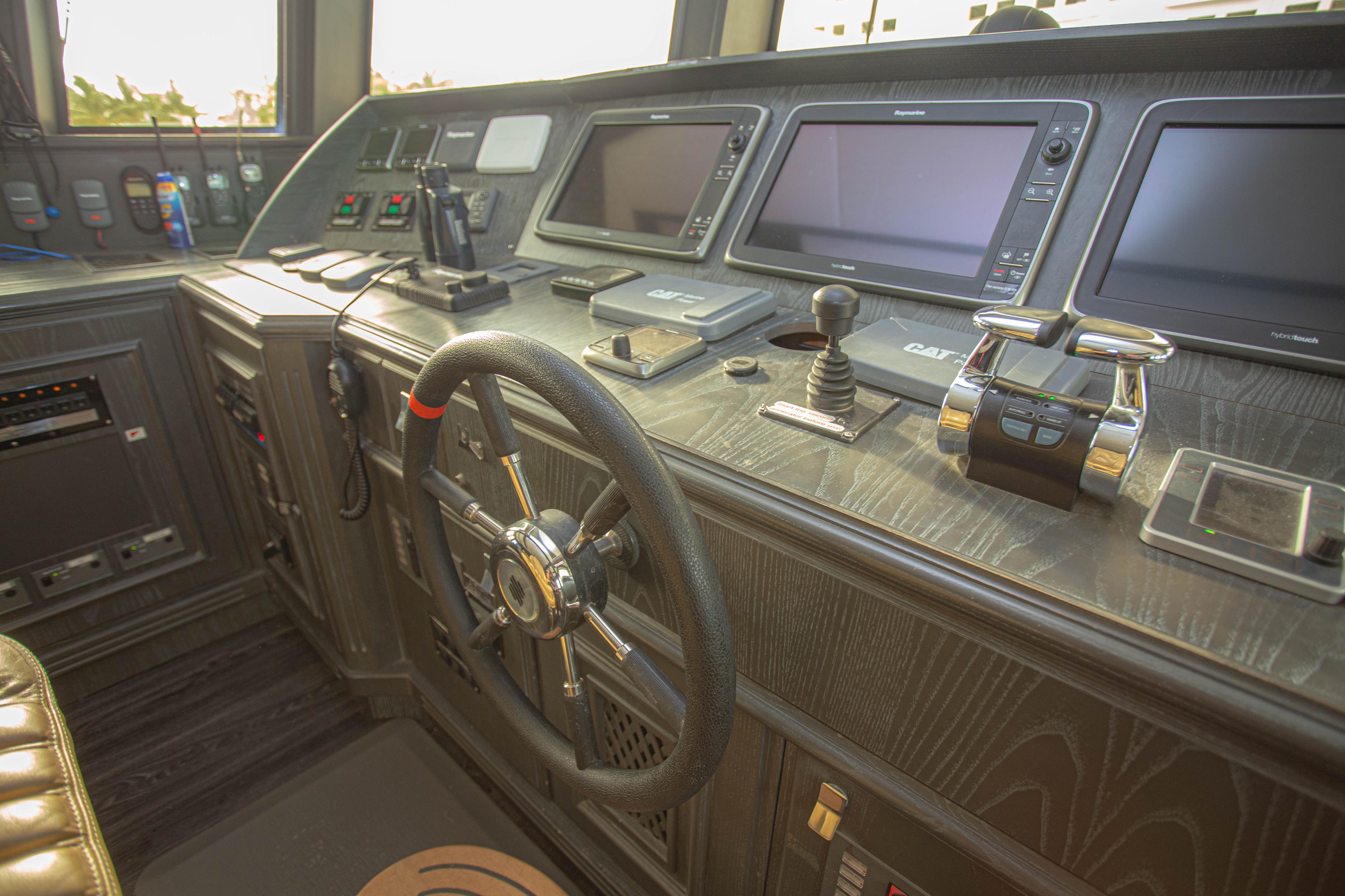 Control panel of 2014 Fifth Ocean Yachts 24m Displacement Explorer Yacht, featuring navigation equipment.