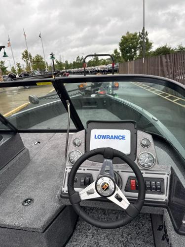 2024 Ranger VS1782SC Angler boat dashboard with Lowrance display, steering wheel, and gauges.