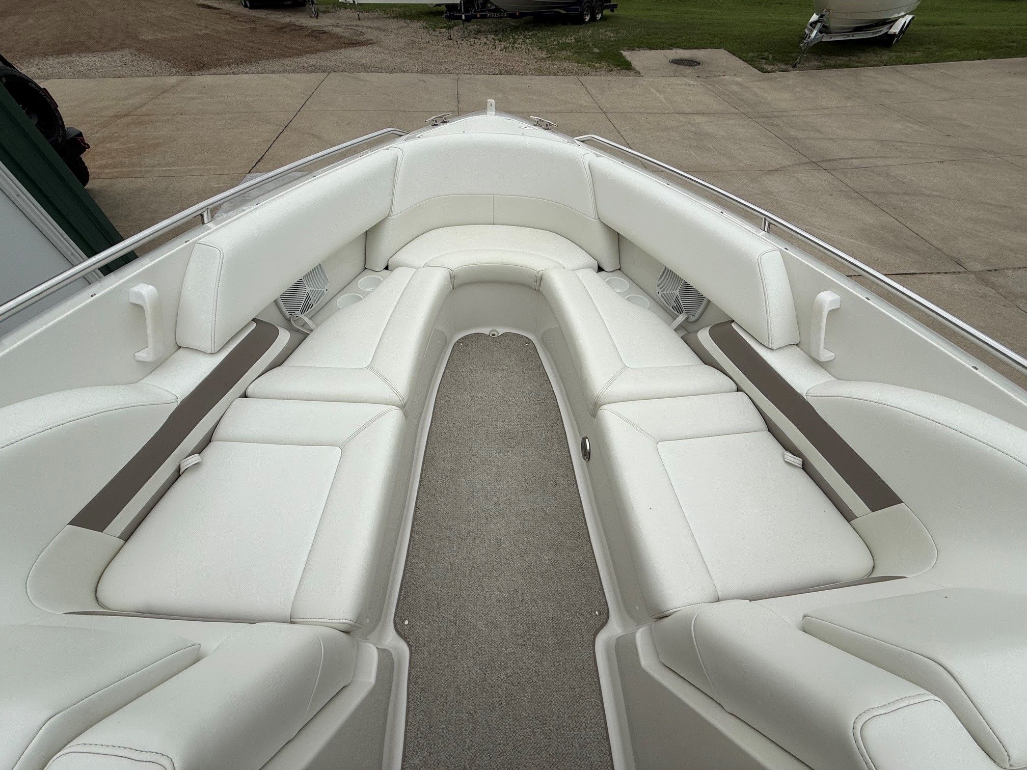 Interior of a 1998 Formula Thunderbird boat with white seating.