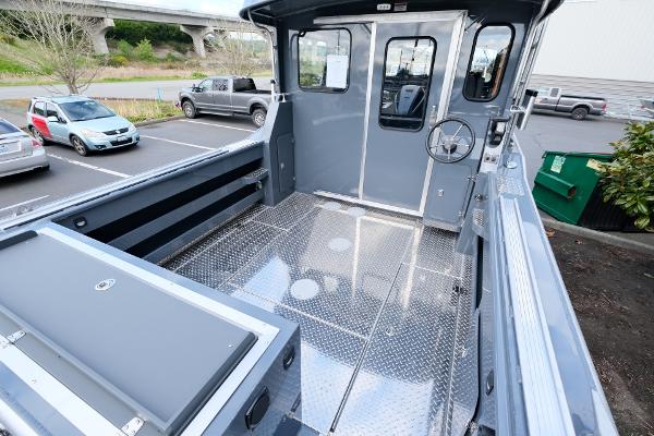 2024 Hewescraft 250 Explorer boat interior with spacious deck and modern design.