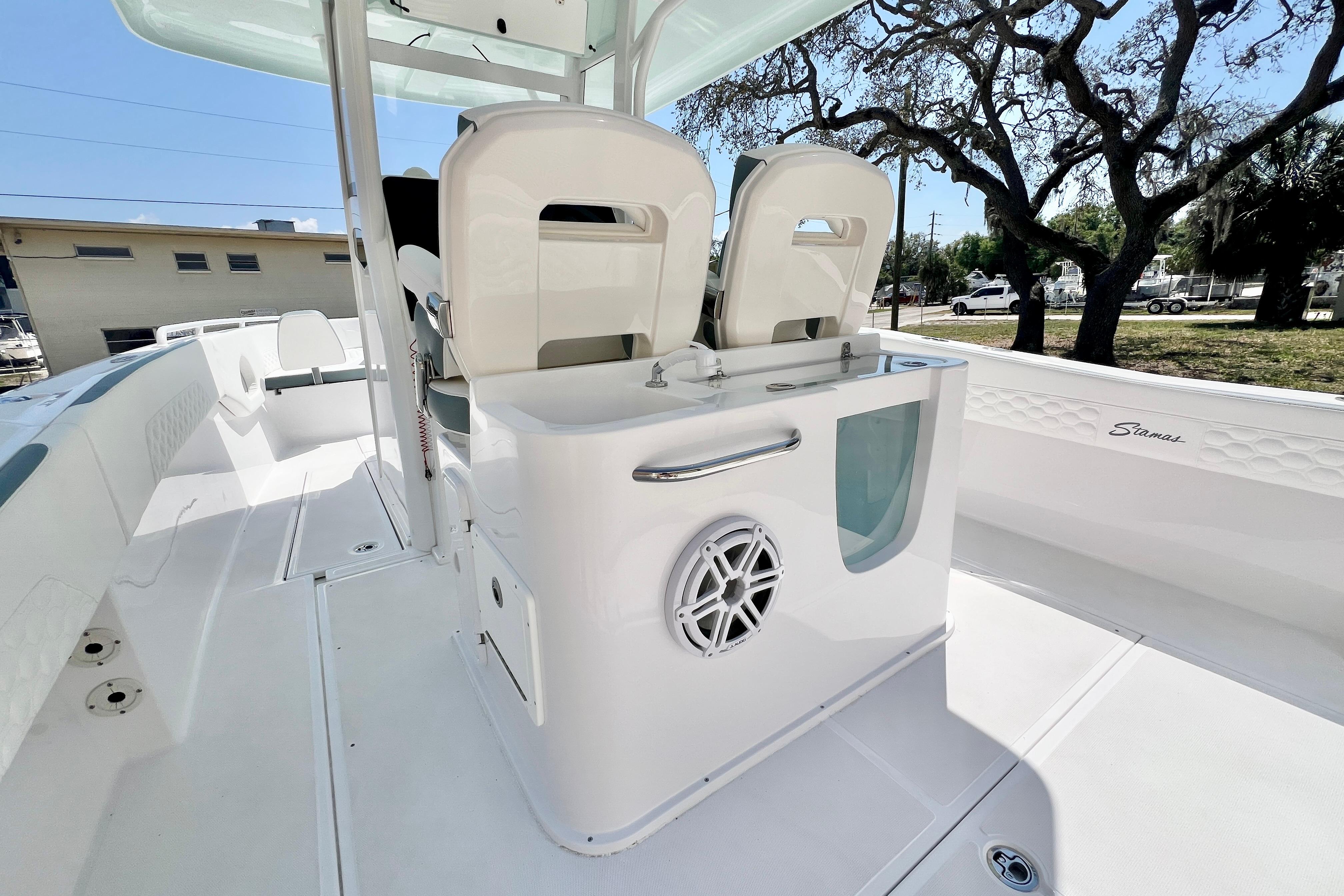 2026 Stamas 31T Aventura boat interior with seating and storage features.