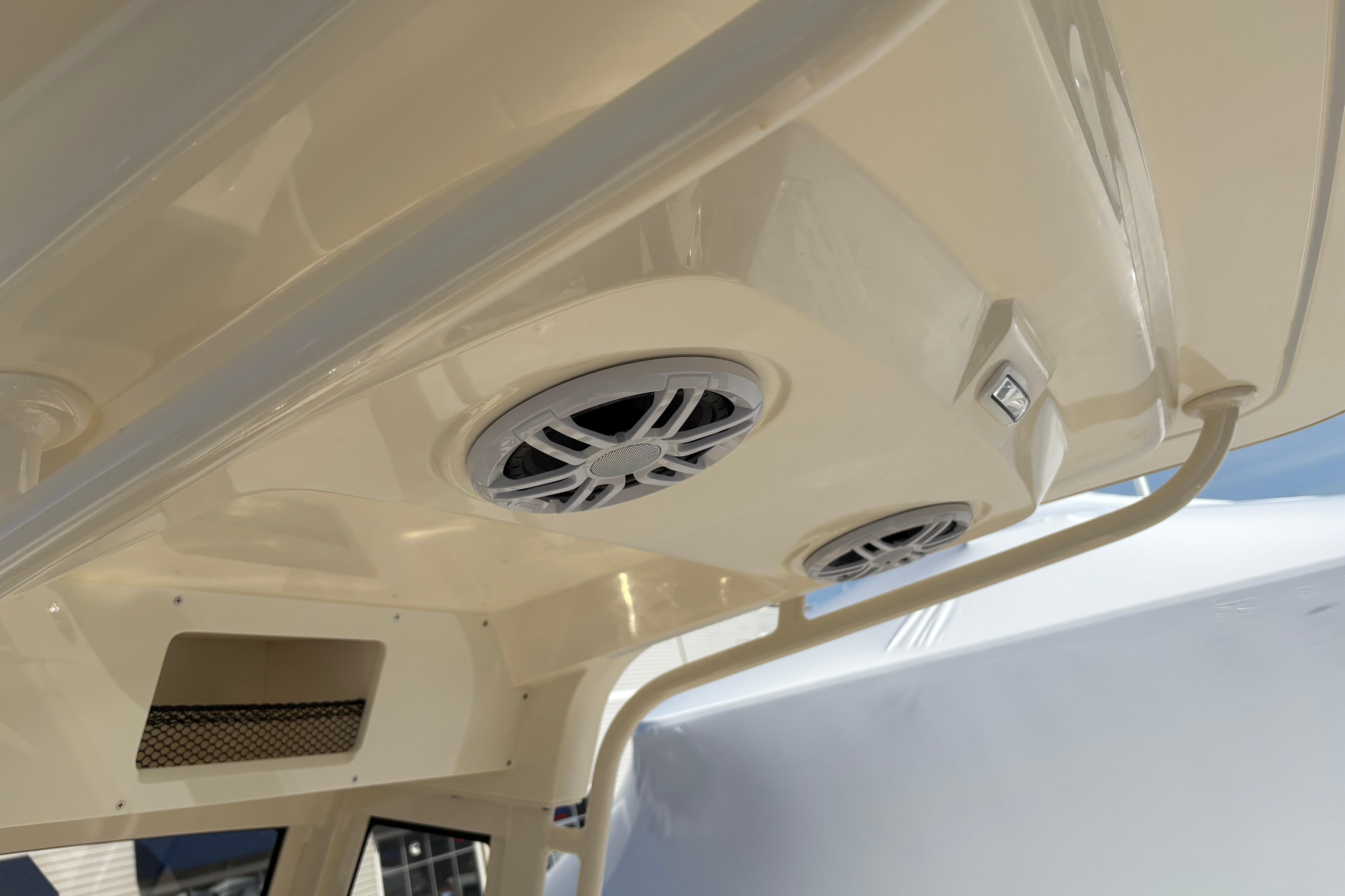 2026 Scout 220 XSF boat interior with built-in speakers and storage compartment.