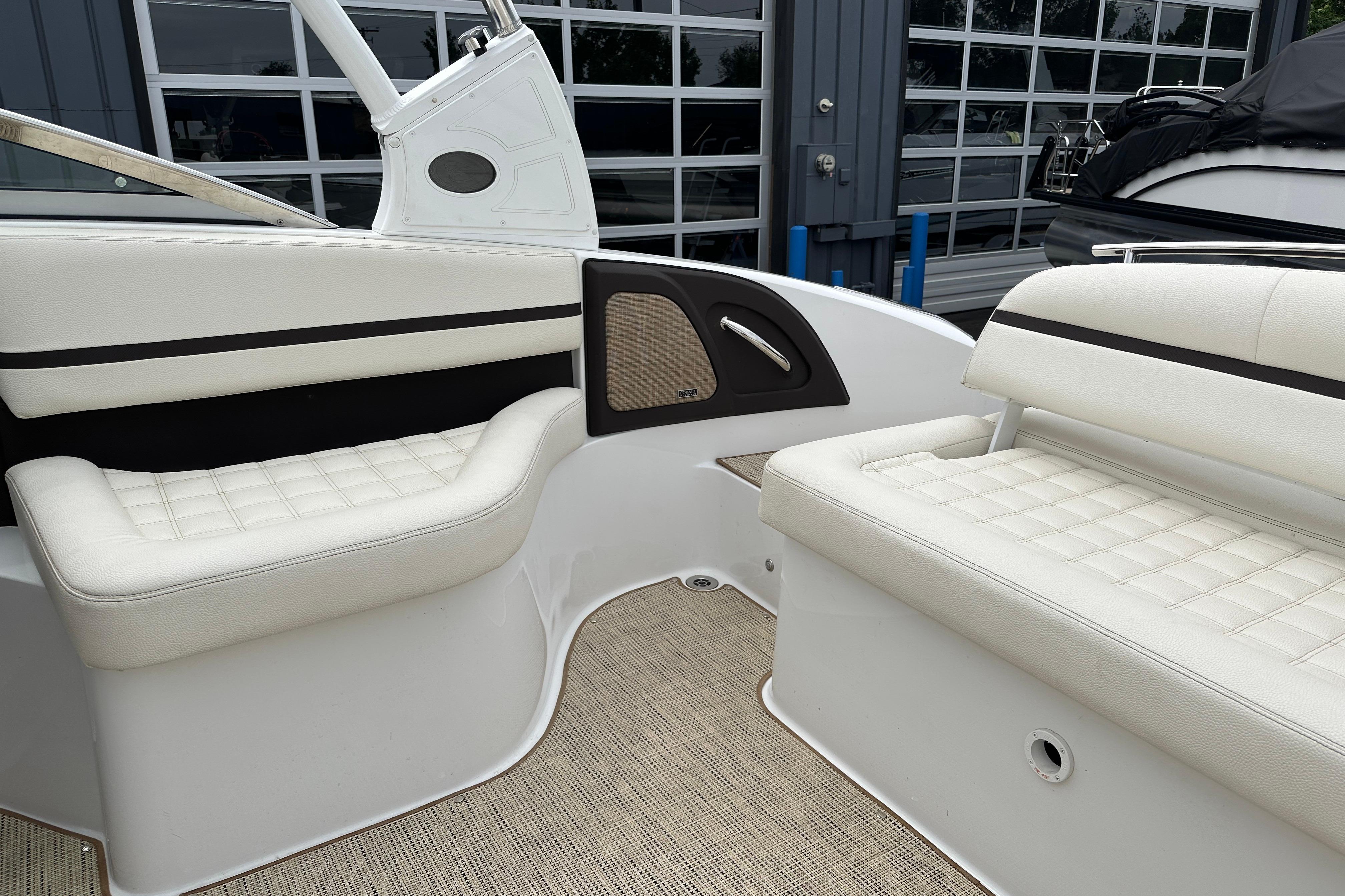 2019 Cobalt R5 boat interior with white cushioned seating and modern design.