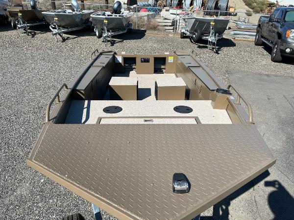 2024 Smoker Craft 1660 Sportsman Pro fishing boat on display.