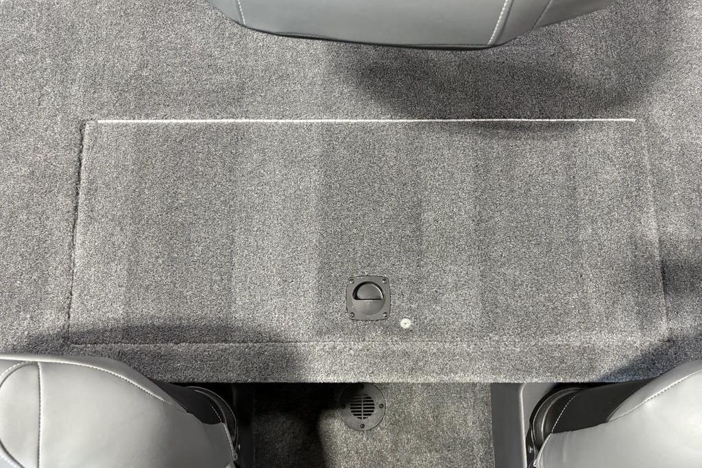 Carpeted interior of 2026 Tracker Bass Tracker Classic XL boat.