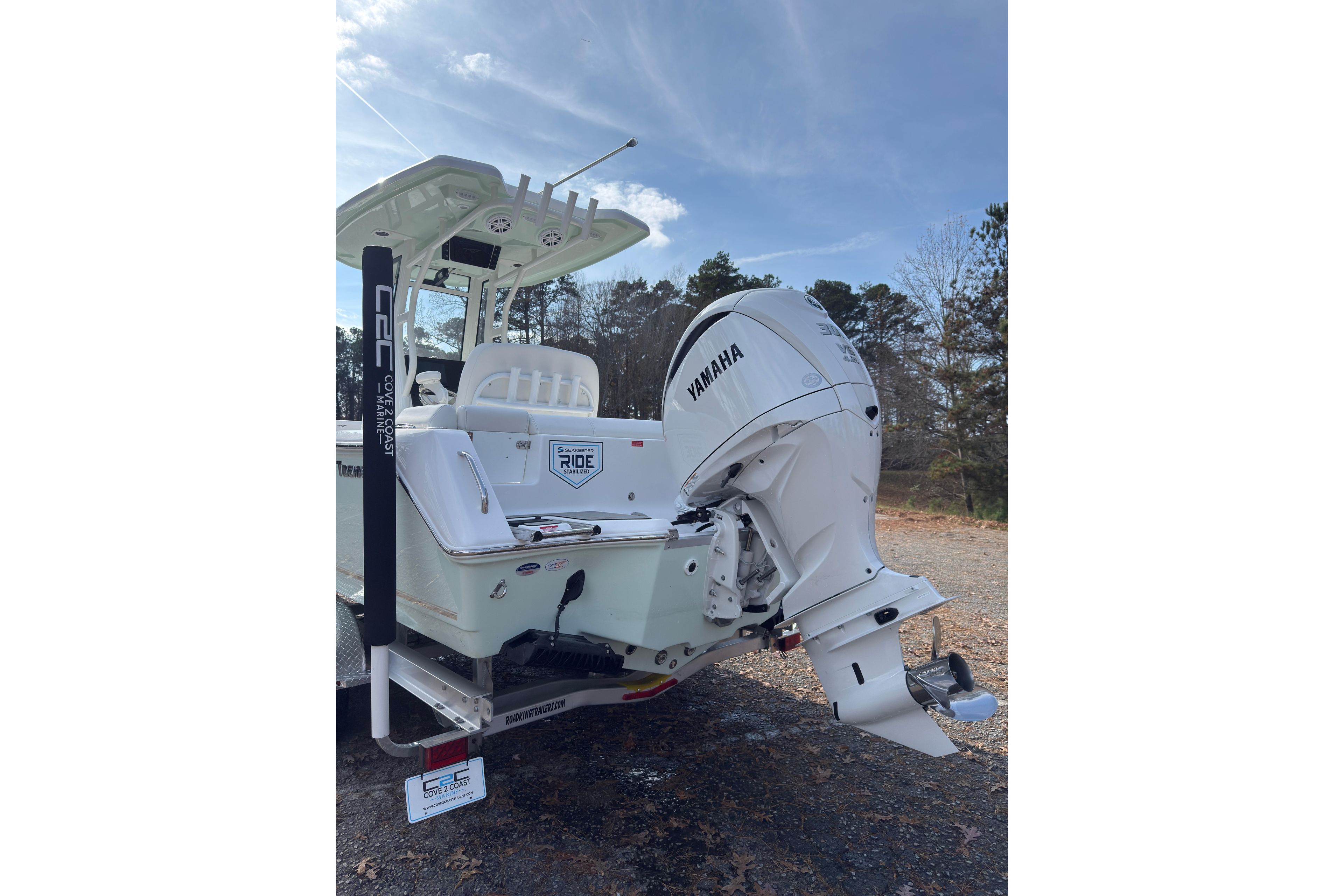 2026 Tidewater 232 LXF boat with Yamaha outboard motor, parked outdoors.