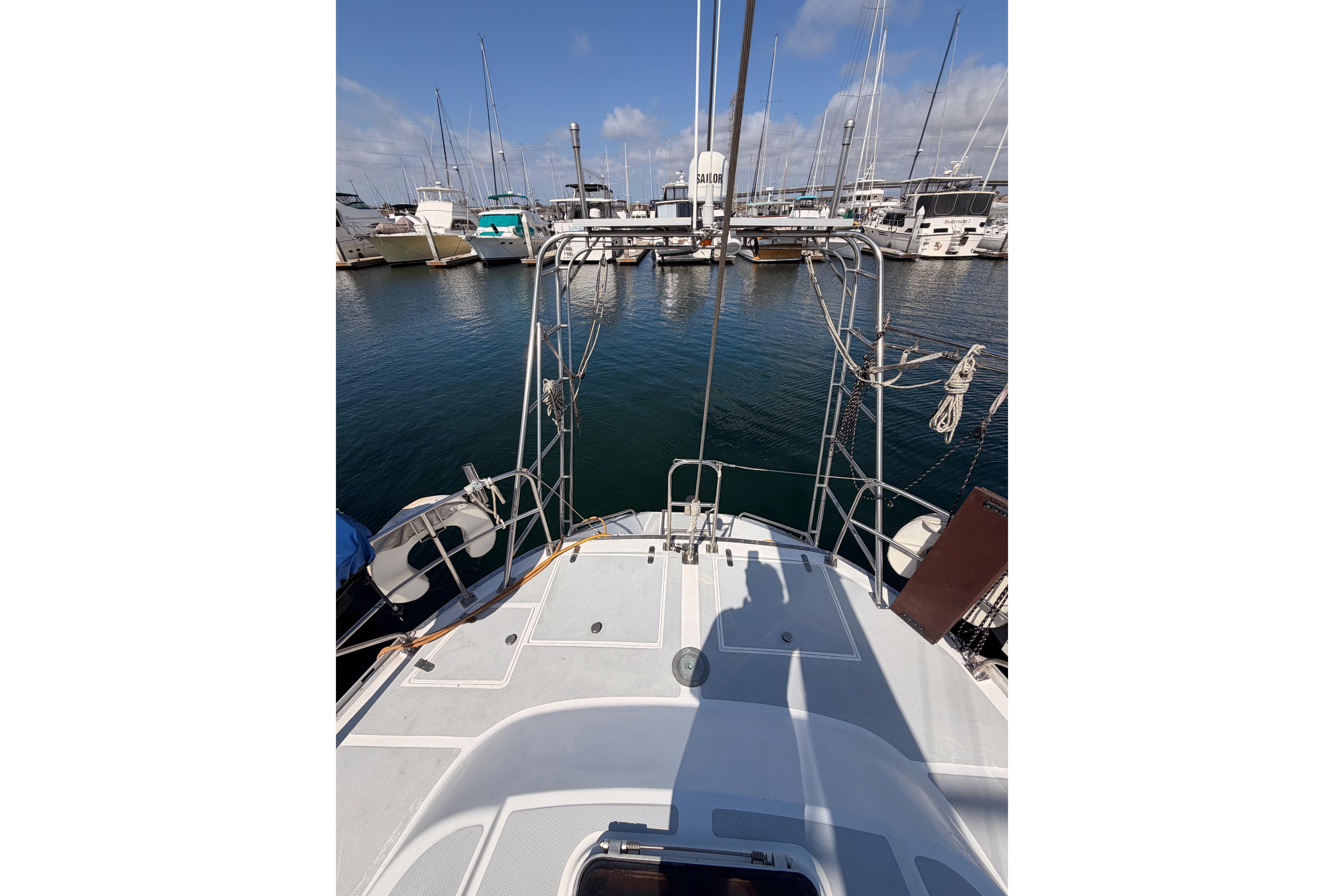 Sailboat docked in marina, view from Hylas 51 deck, 1991 model.