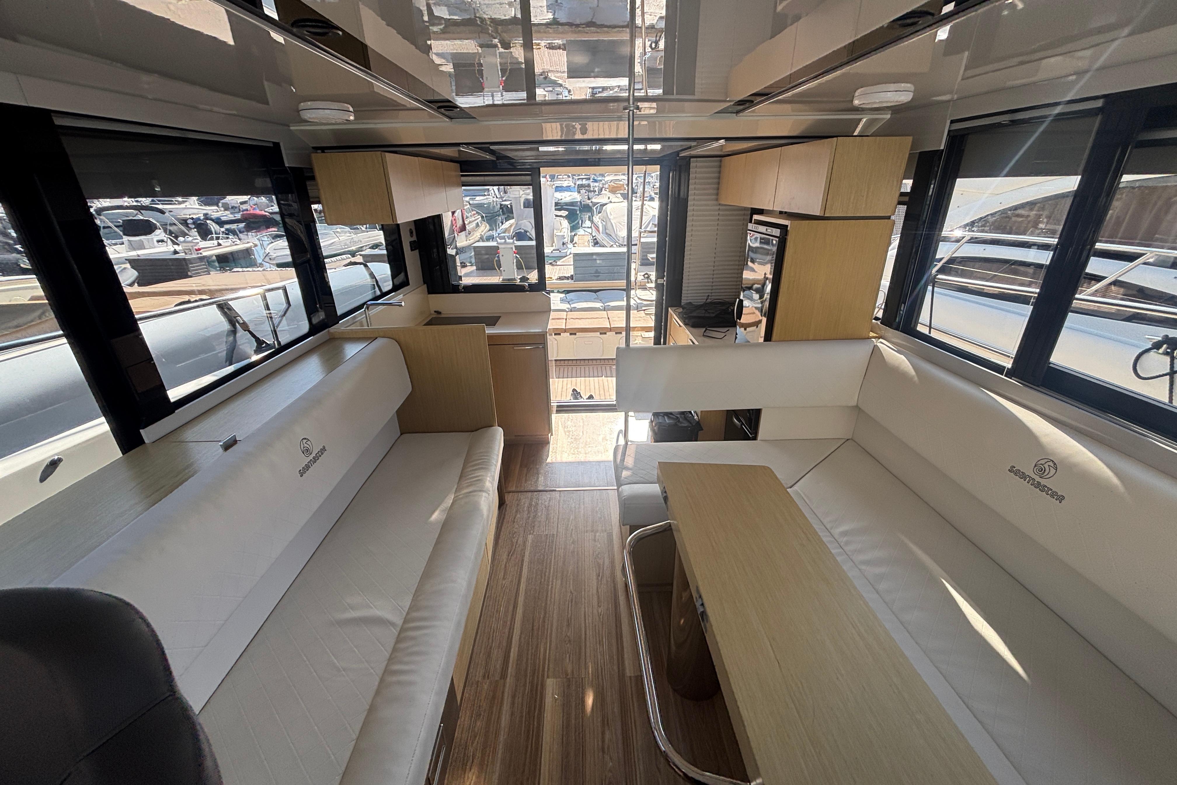 Interior of 2021 Cobra Yachts 45 Seamaster, featuring modern seating and sleek design.