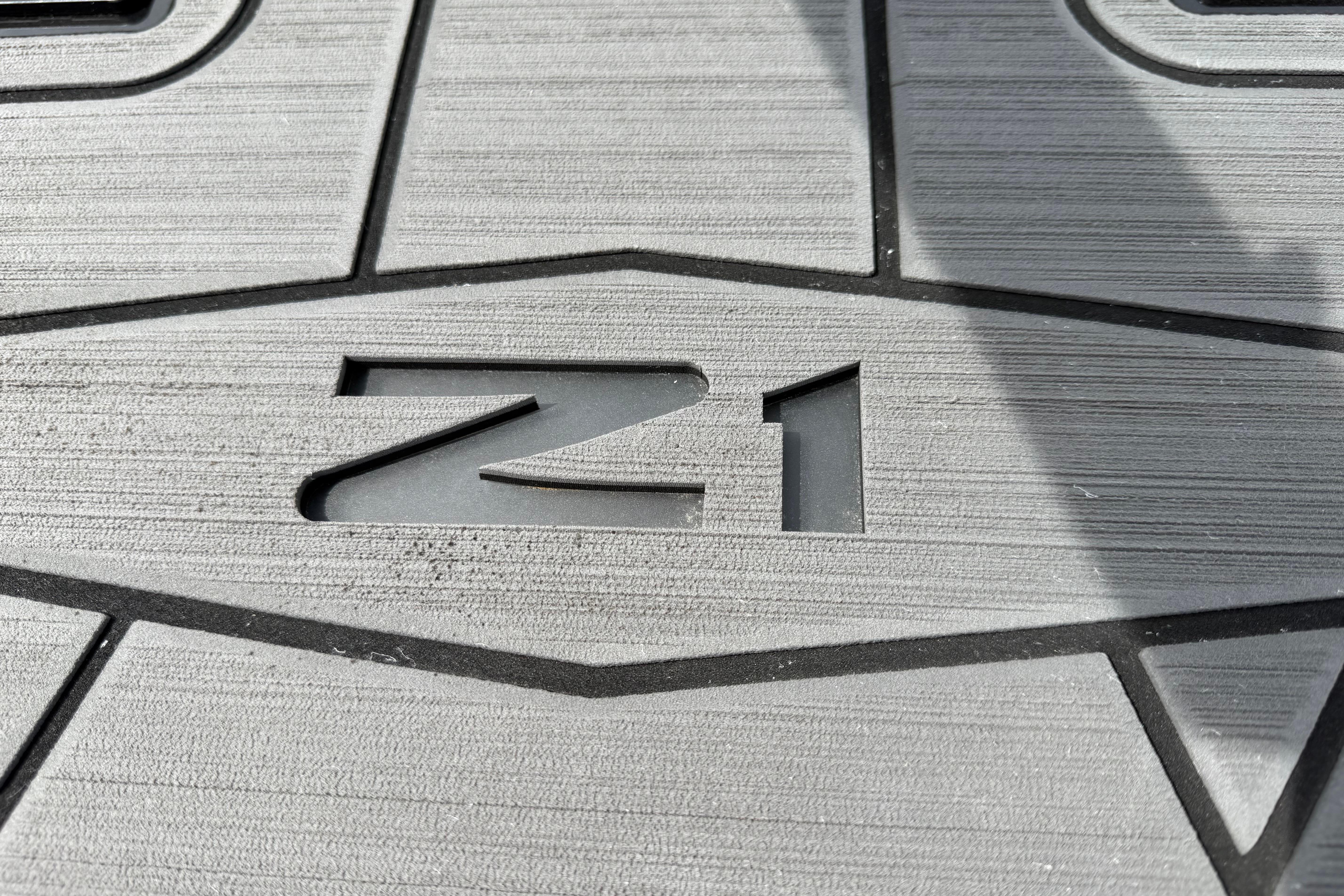 2024 Tigé Z1 boat floor with embossed design and shadow.