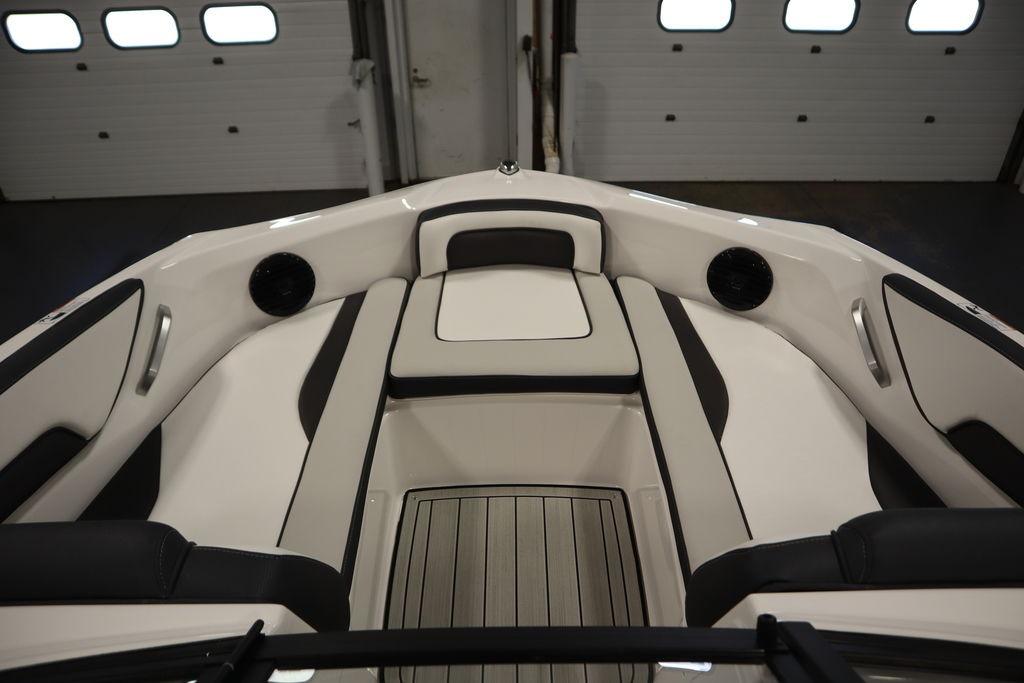 Interior view of 2026 Yamaha Boats 195S, featuring sleek seating and modern design.