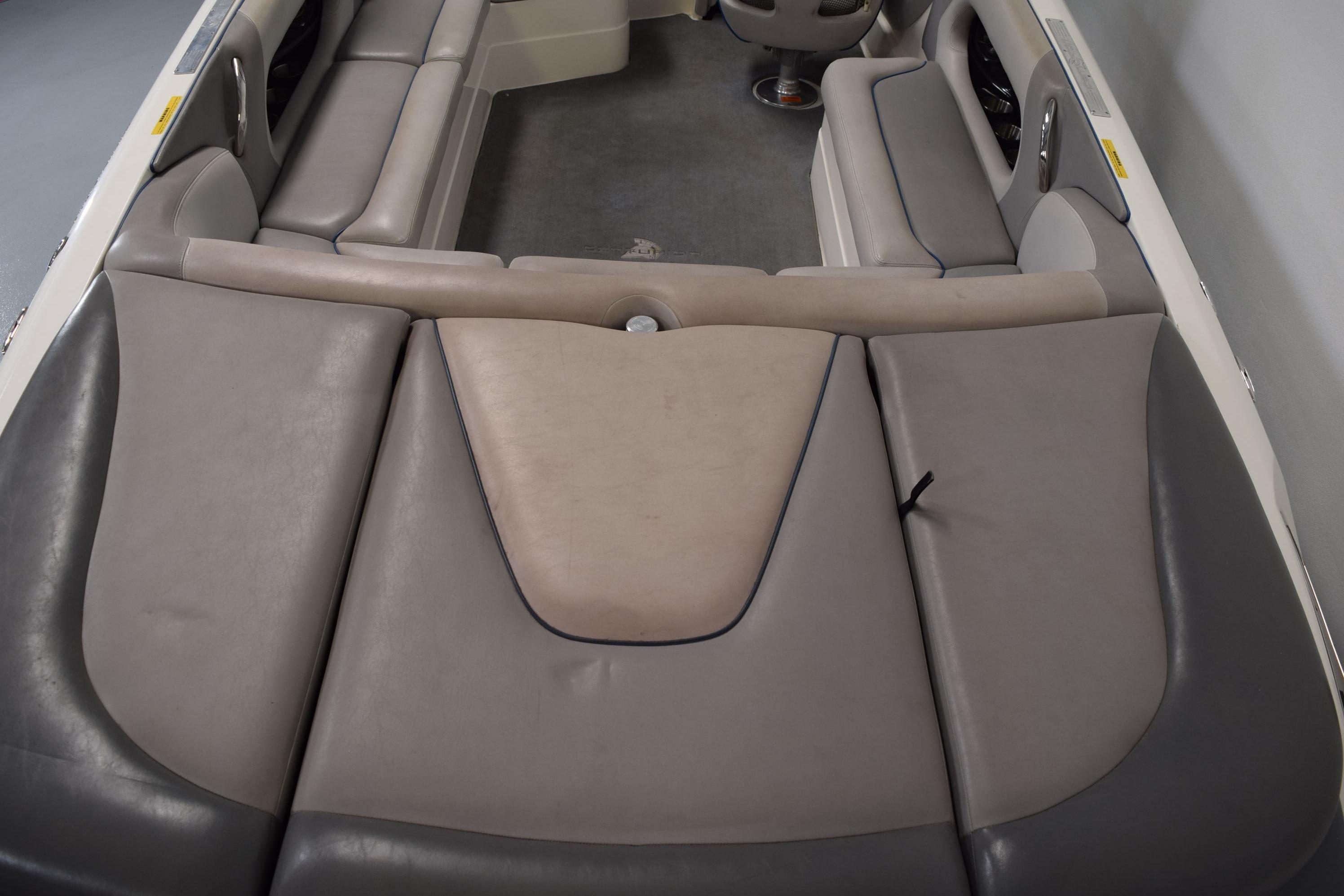 2007 Centurion SV 240 boat interior with gray and beige seating arrangement.