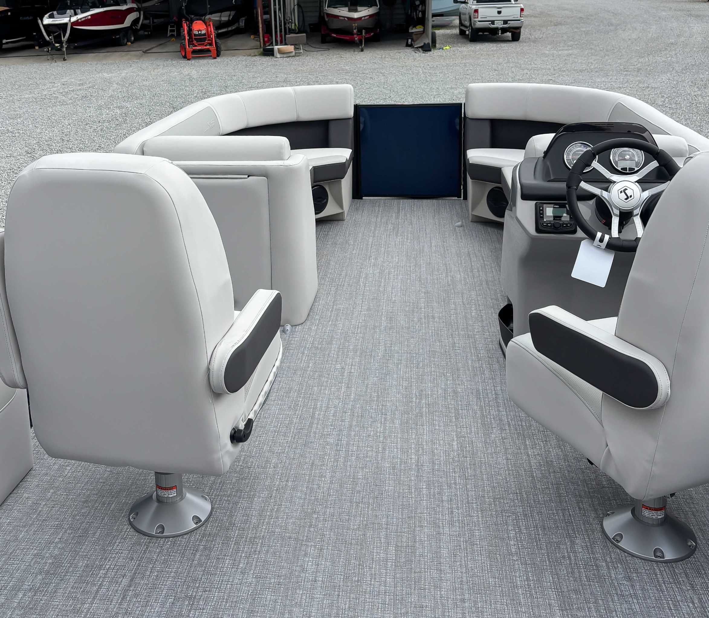 Interior of 2026 Harris Cruiser 230 SLDH with gray seating.