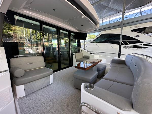 2019 Tiara Yachts C53 interior lounge with modern seating and table.