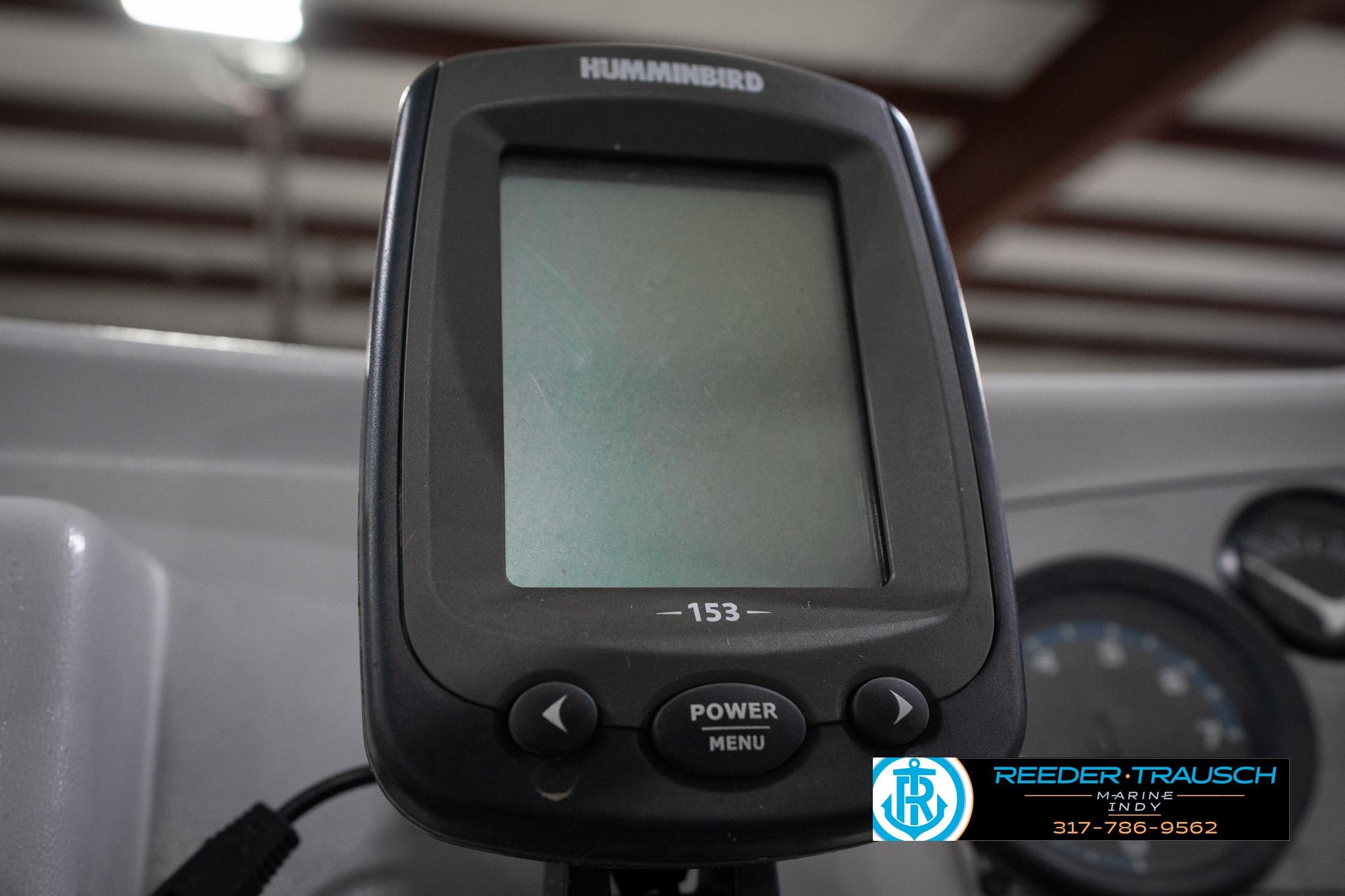 Close-up of a Humminbird fish finder on a 1992 Godfrey Sweetwater boat.