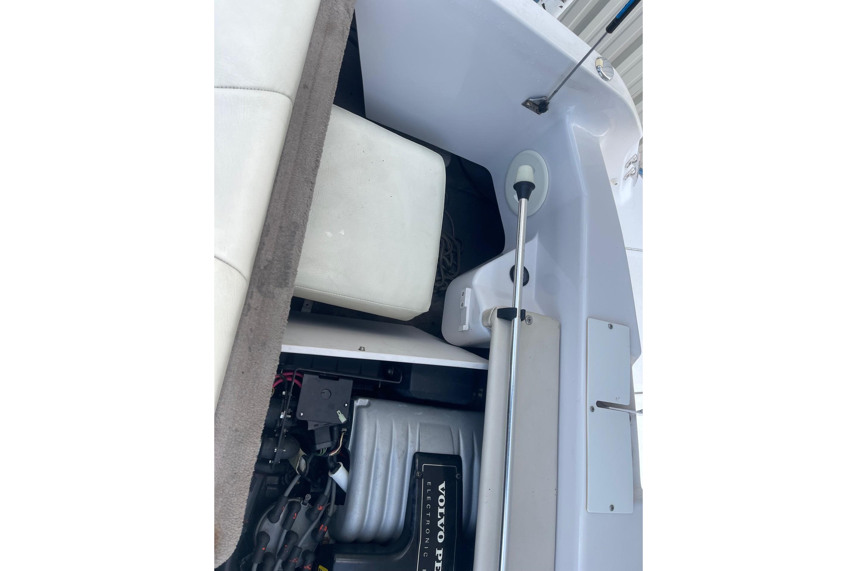 1996 Four Winns 200 Horizon boat engine compartment with Volvo Penta engine.