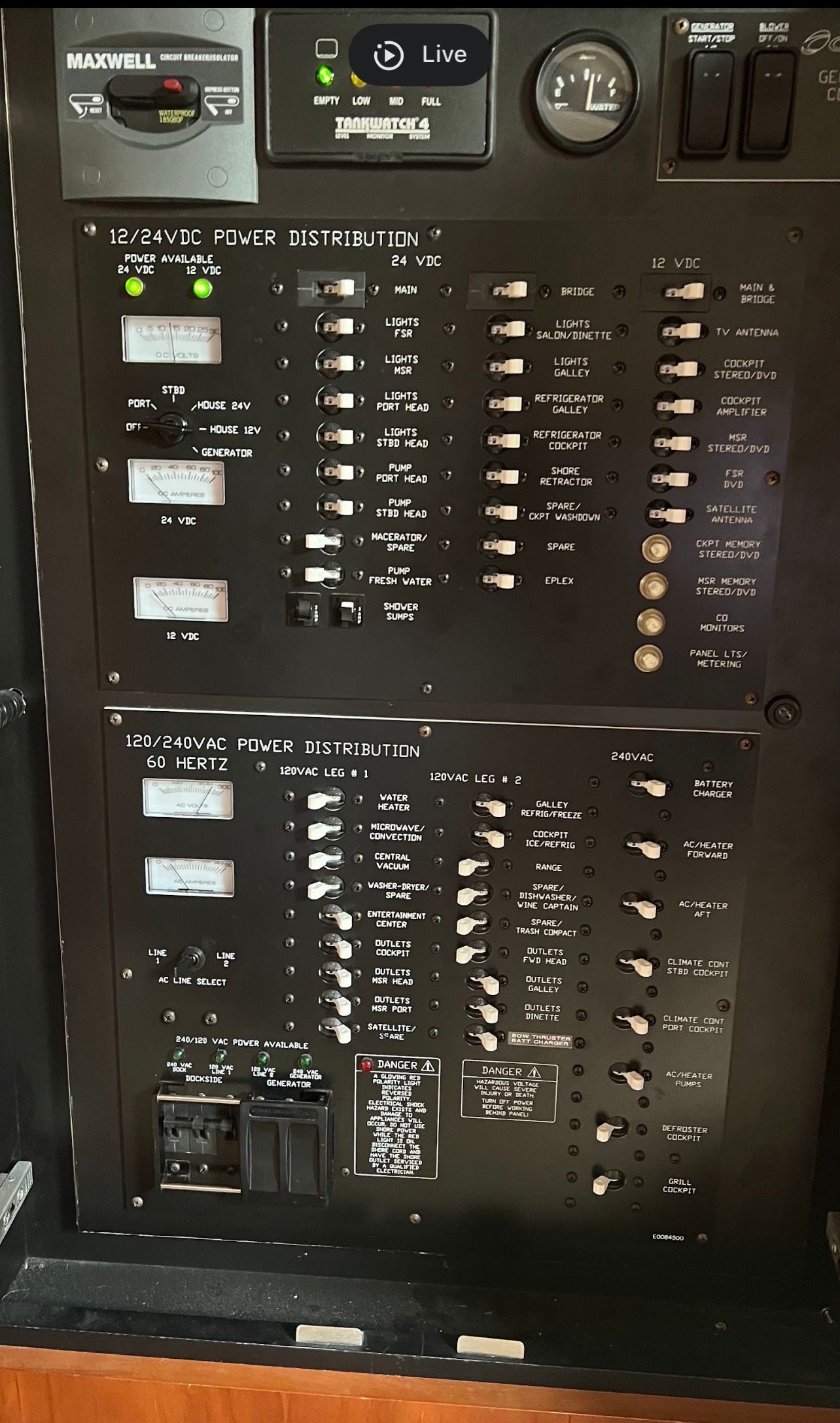 Electrical control panel with various switches and indicators for power distribution.