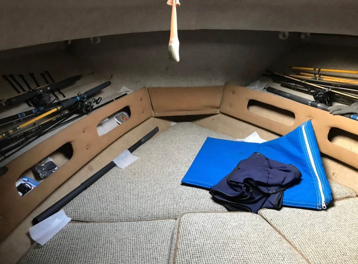Interior of 1984 Tiara Yachts PURSUIT 2600 with fishing gear.