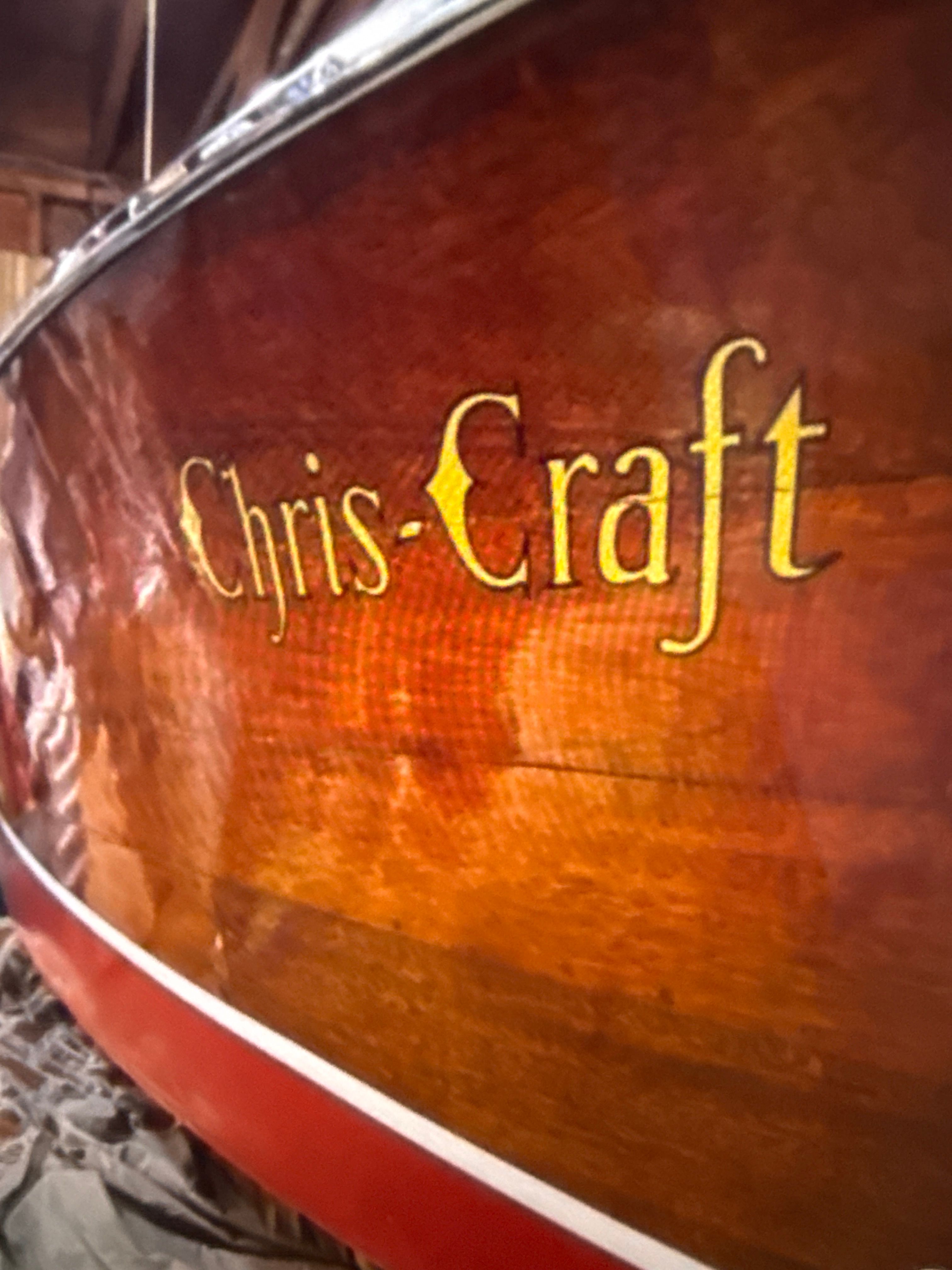 1940 Chris-Craft Barrelback boat with wooden finish.