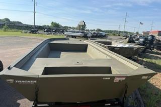 2025 Tracker Grizzly 1860 Utility boat in outdoor setting, showcasing spacious interior.