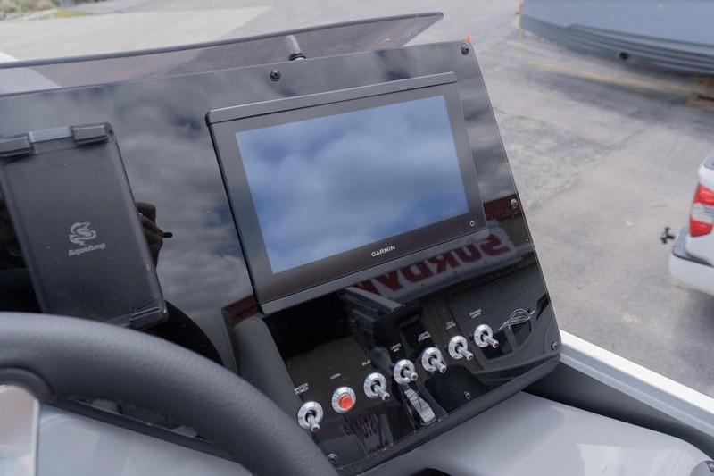 Dashboard of 2026 SunCatcher Elite 326 SL with Garmin display and controls.
